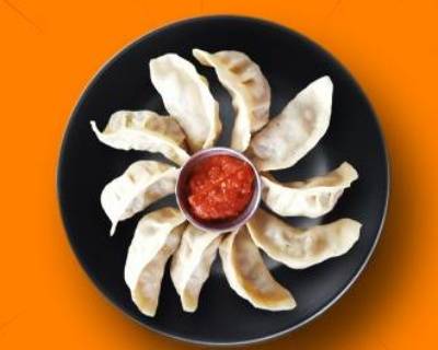 Order Chicken Steamed Momo food online from Mad Over Curry store, Youngstown on bringmethat.com