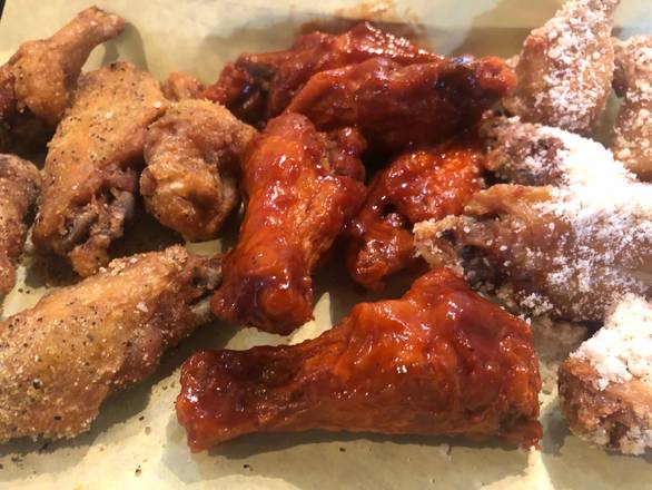 Order Bone In Wings (50) food online from Wings Over Seagoville store, Seagoville on bringmethat.com