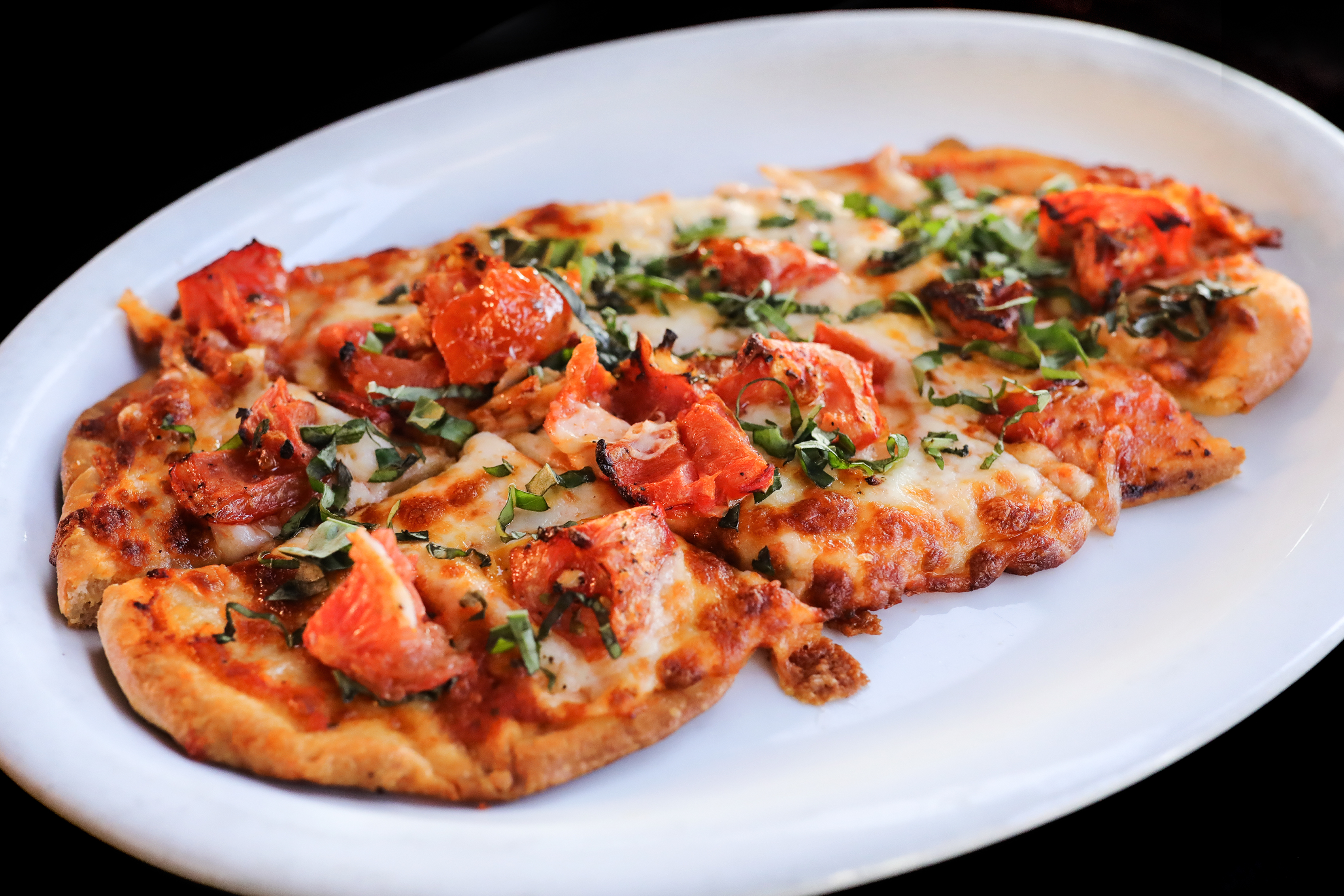Order Margherita Flatbread Pizza food online from Port Restaurant & Bar store, Corona Del Mar on bringmethat.com