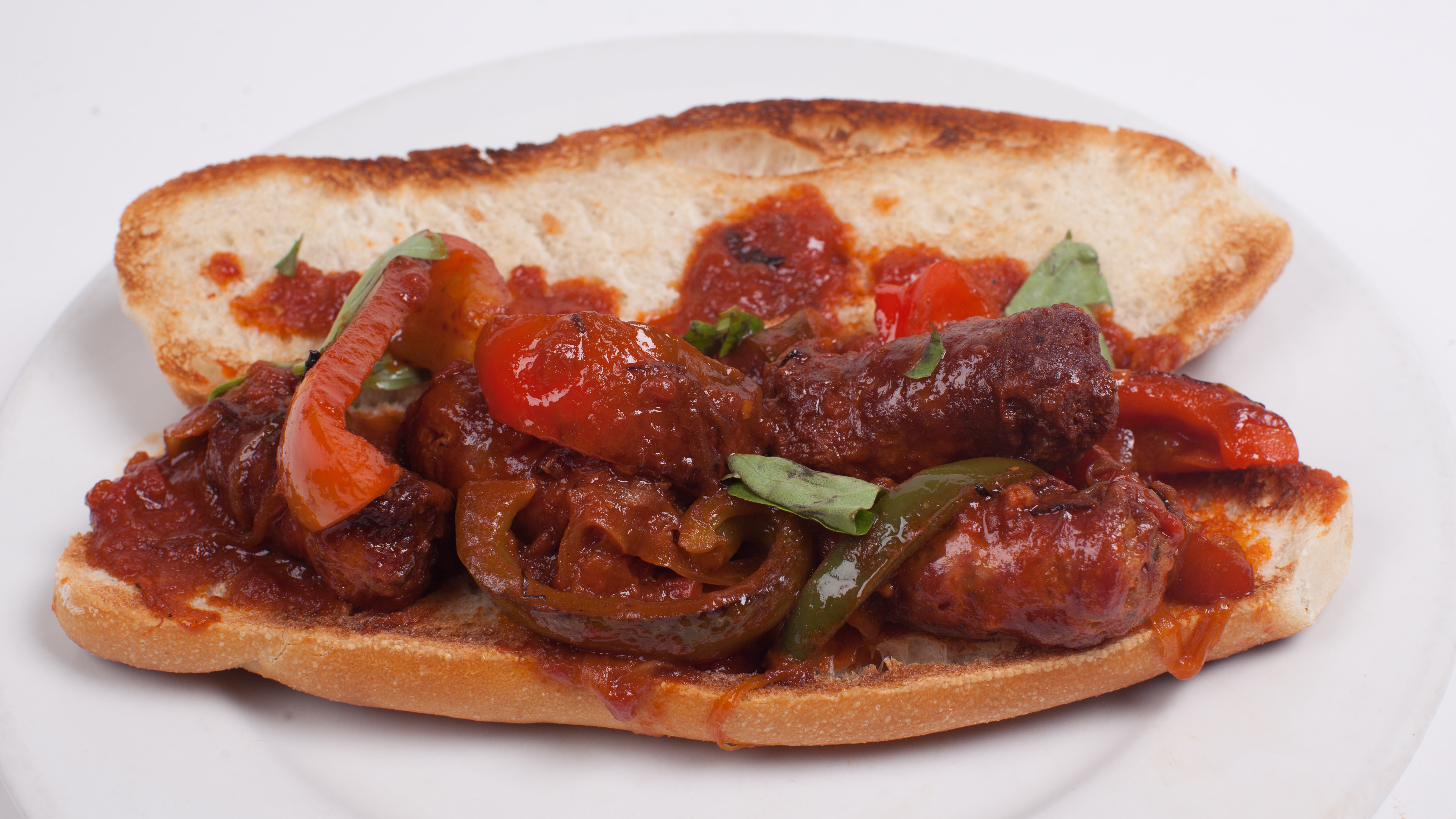 Order Sausage, Peppers & onions Hero food online from Umberto's Pizzeria store, New Hyde Park on bringmethat.com
