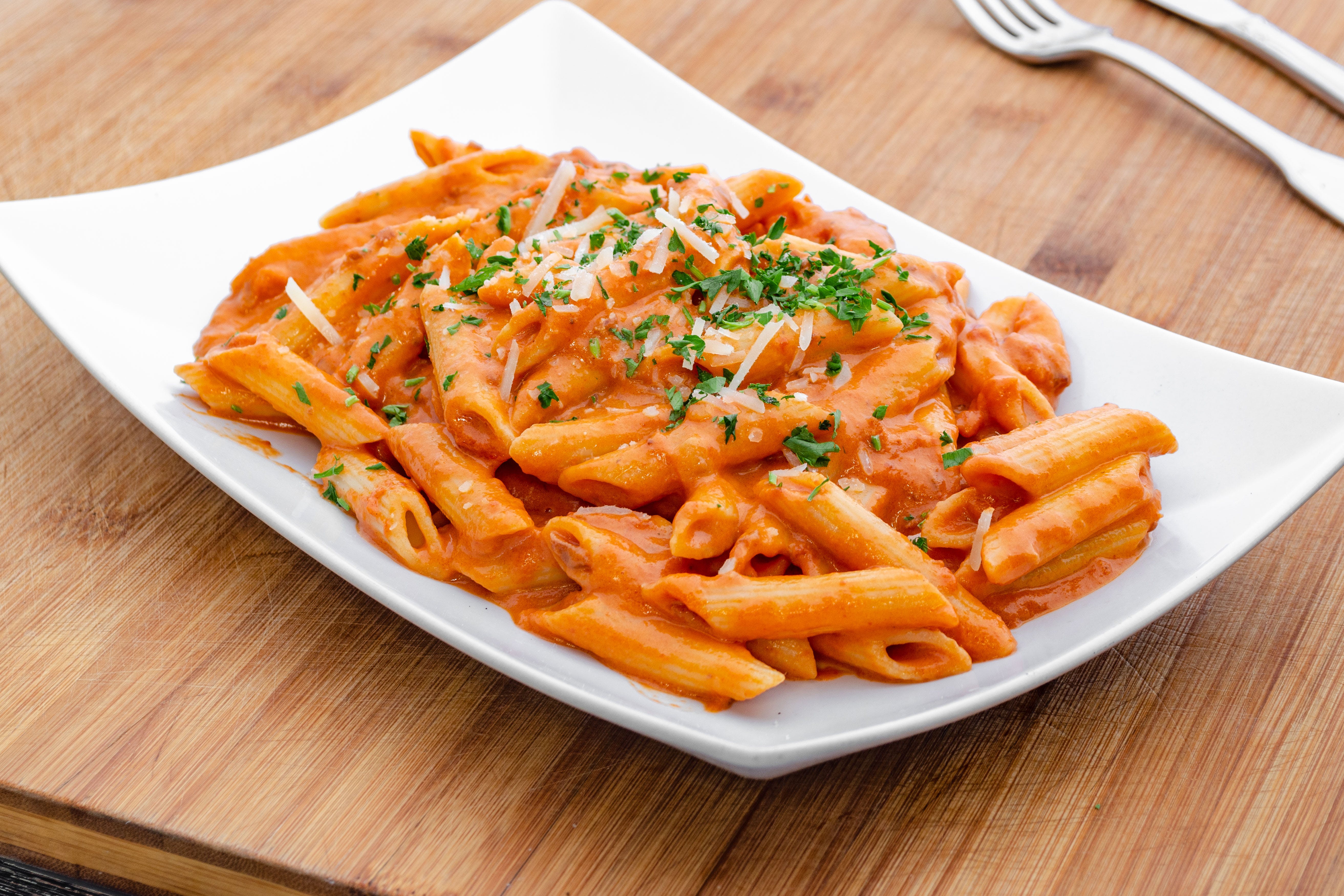 Order Penne Alla Vodka - Entree food online from Maria's Pizza store, Yorktown Heights on bringmethat.com