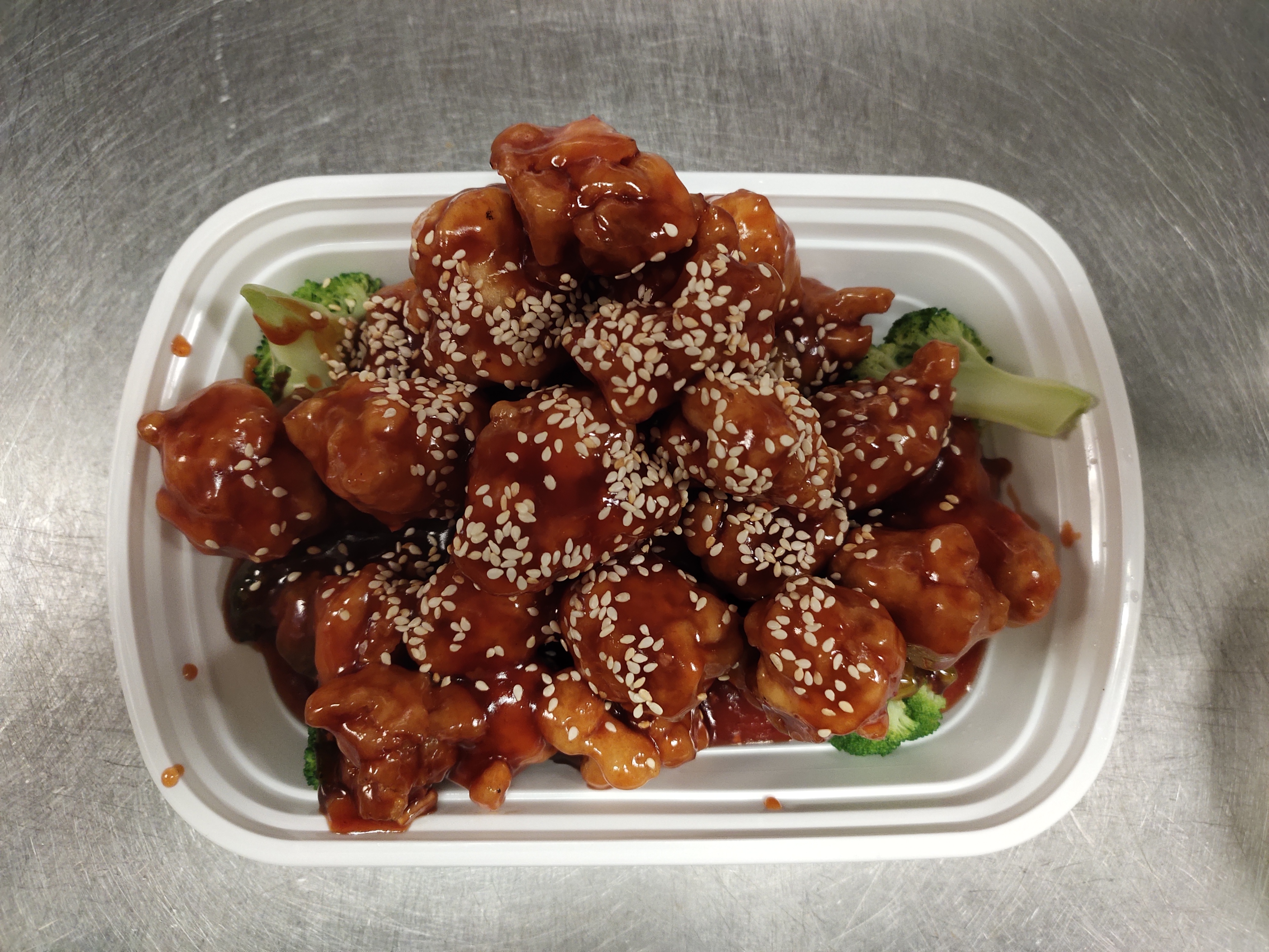 Order 10. Sesame Chicken food online from Jay Asian Fusion store, Longs on bringmethat.com
