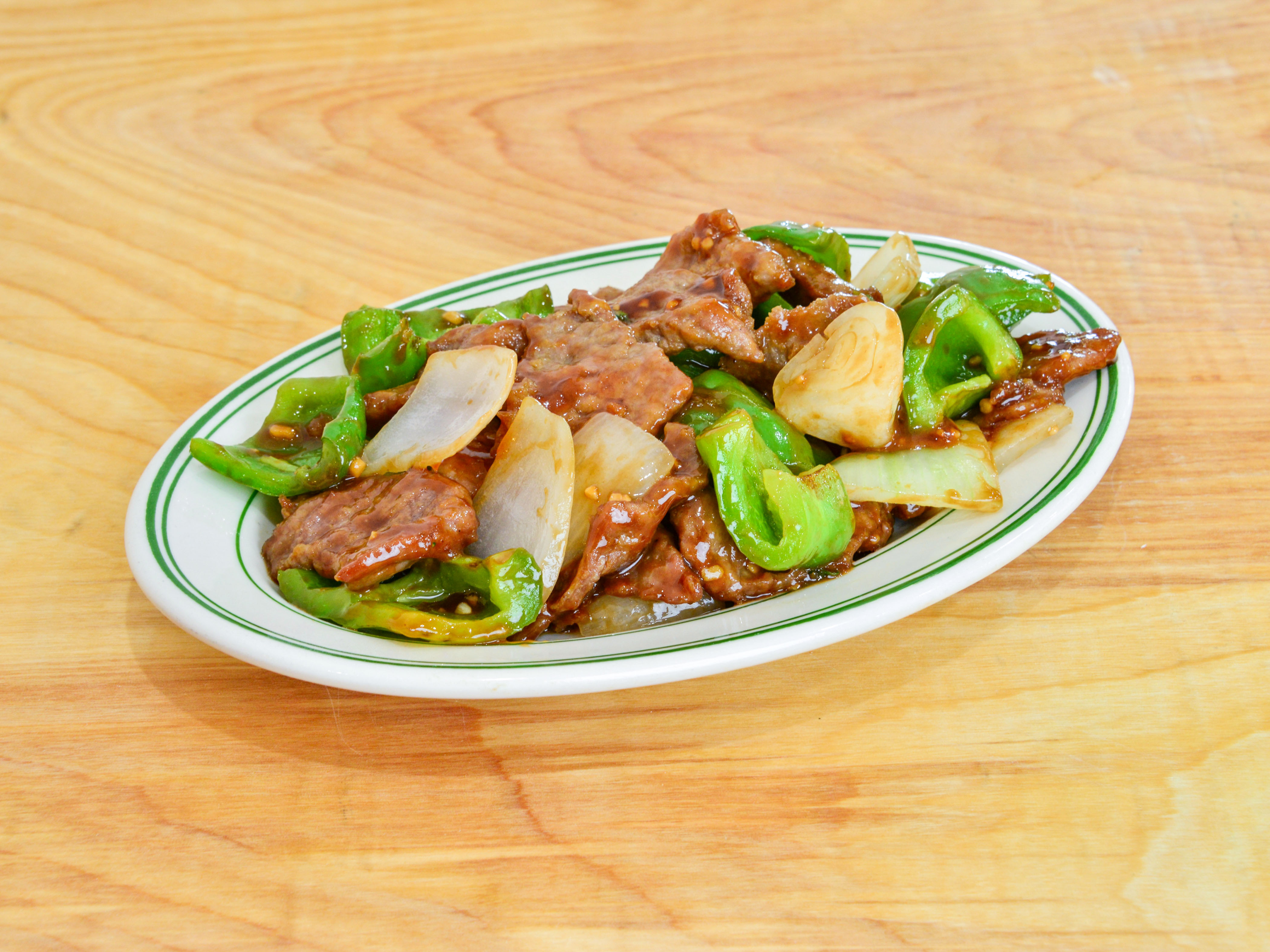 Order C5. Pepper Steak with Onion food online from Hong Kong Buffet Sushi Hibachi Lounge store, Wadsworth on bringmethat.com