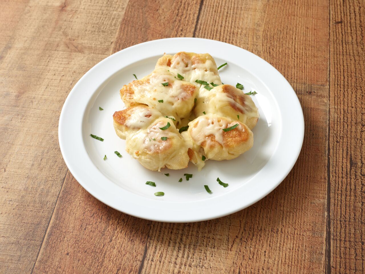 Order Garlic Knots with Melted Mozzarella food online from The Garlic Knot - University Hills store, Denver on bringmethat.com