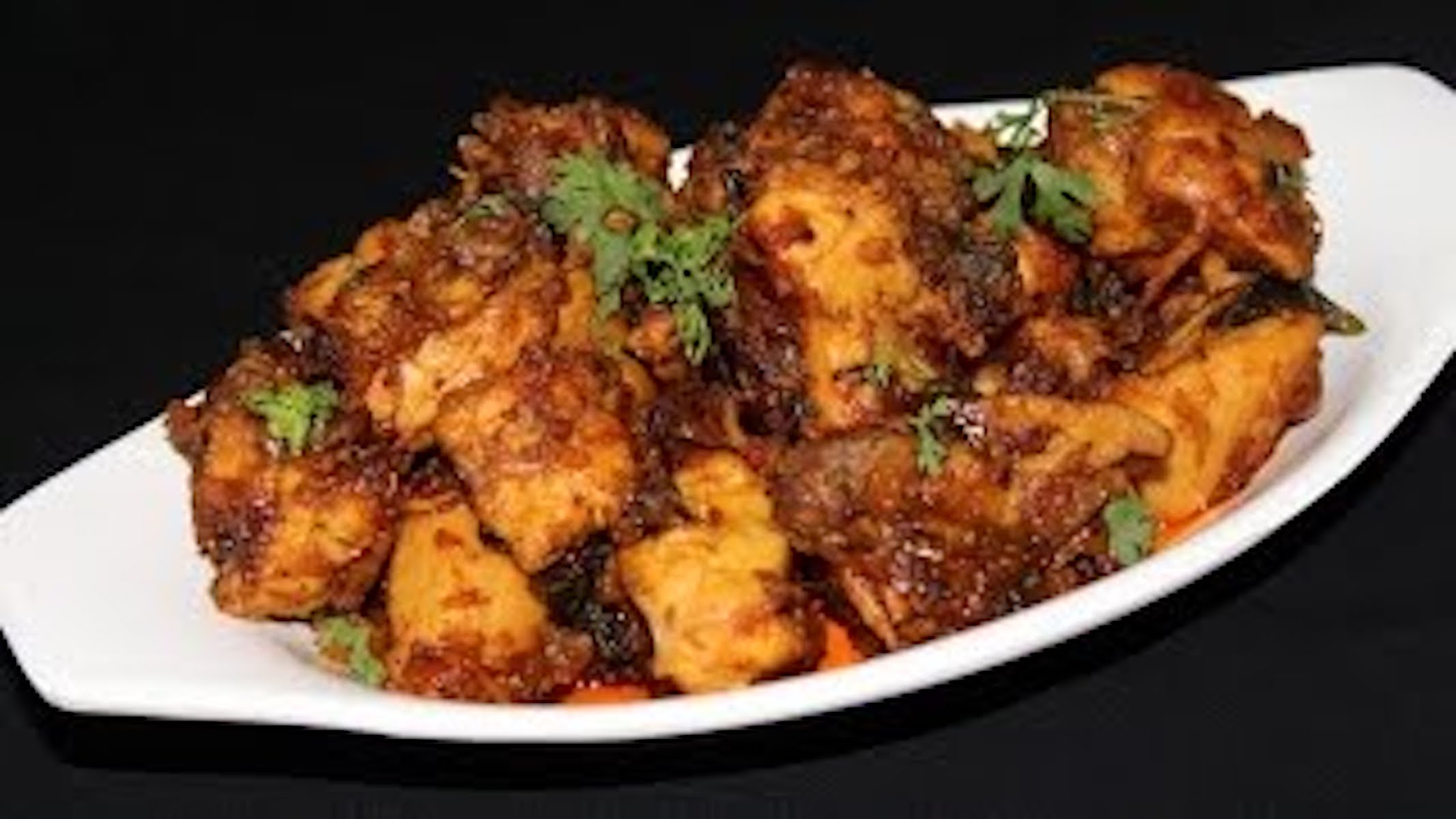 Order Andhra kodi Vepudu food online from Southern Spice Indian Restaurant store, Lawndale on bringmethat.com