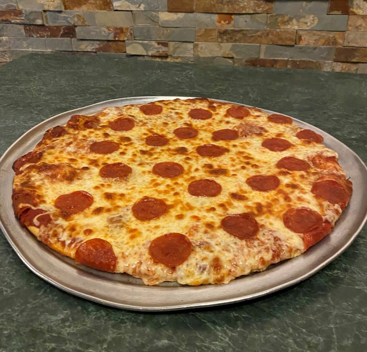 Order Thin Crust Pizza food online from Beggars Pizza store, Gary on bringmethat.com