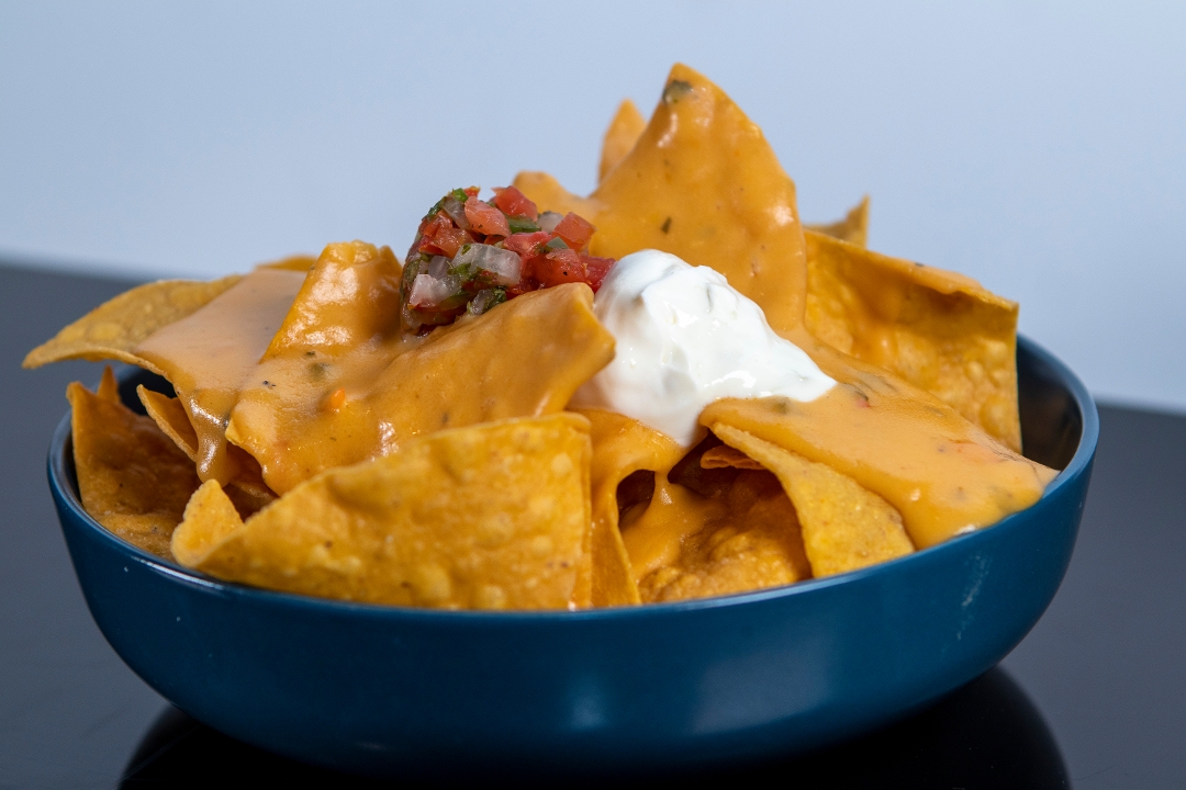 Order Nachos food online from Snakes & Lattes Tucson store, Tucson on bringmethat.com