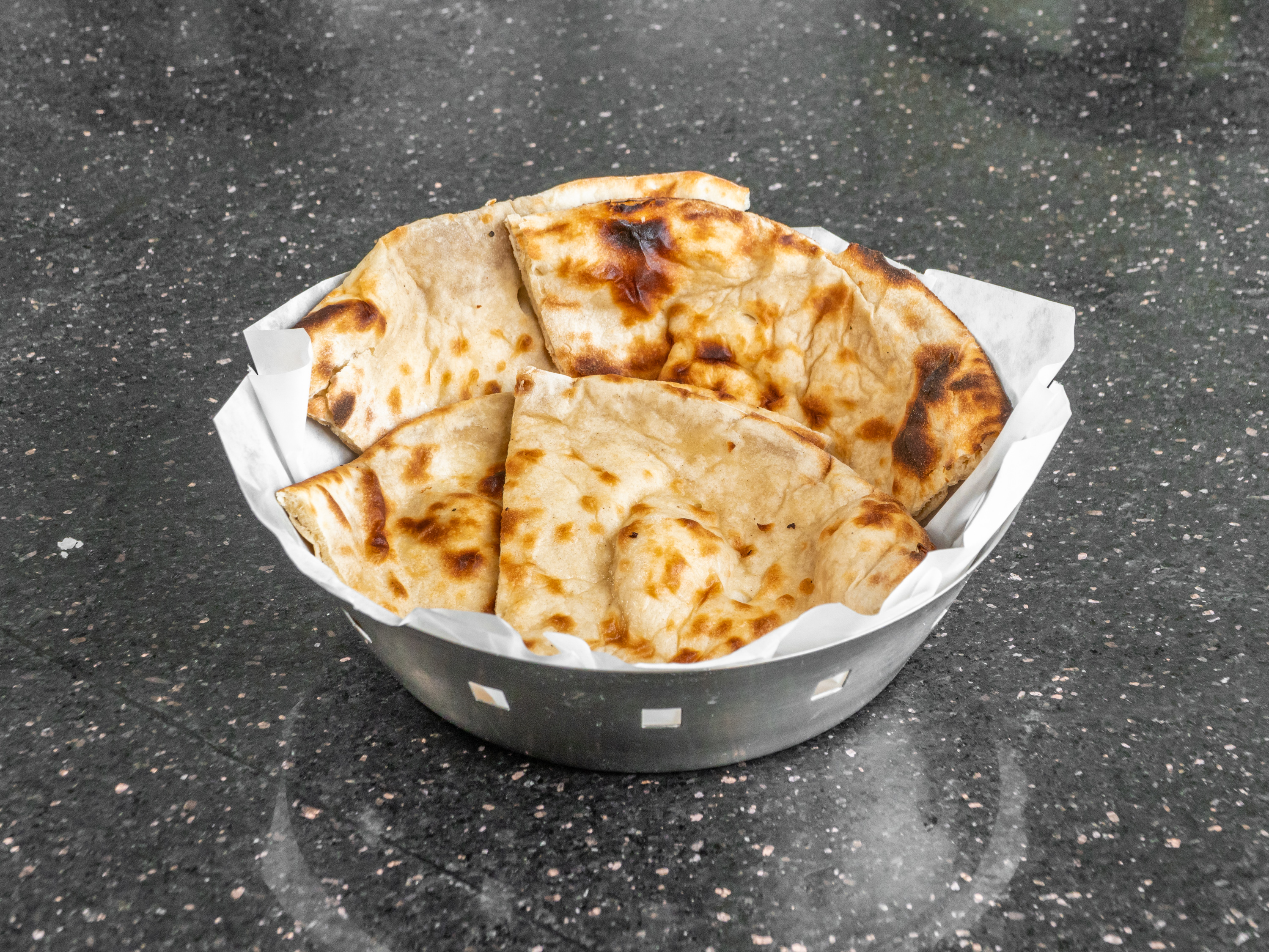Order Naan food online from Madras Palace store, Gaithersburg on bringmethat.com