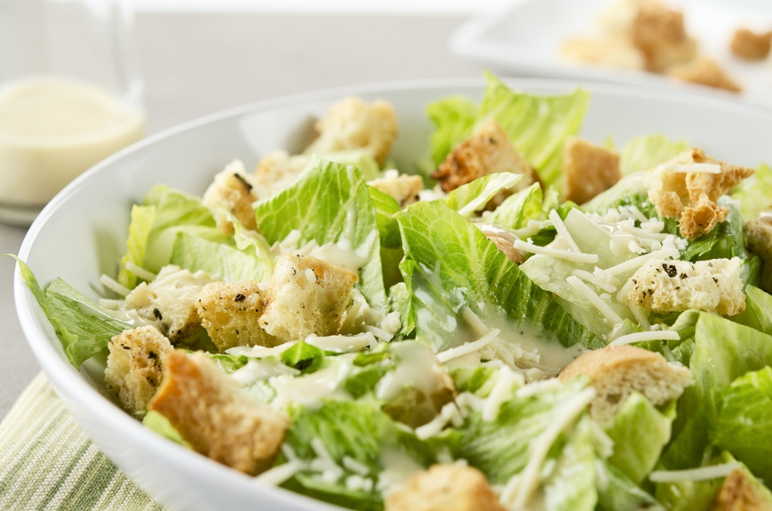 Order Caesar Salad food online from Freddy Wings & Wraps store, Newark on bringmethat.com