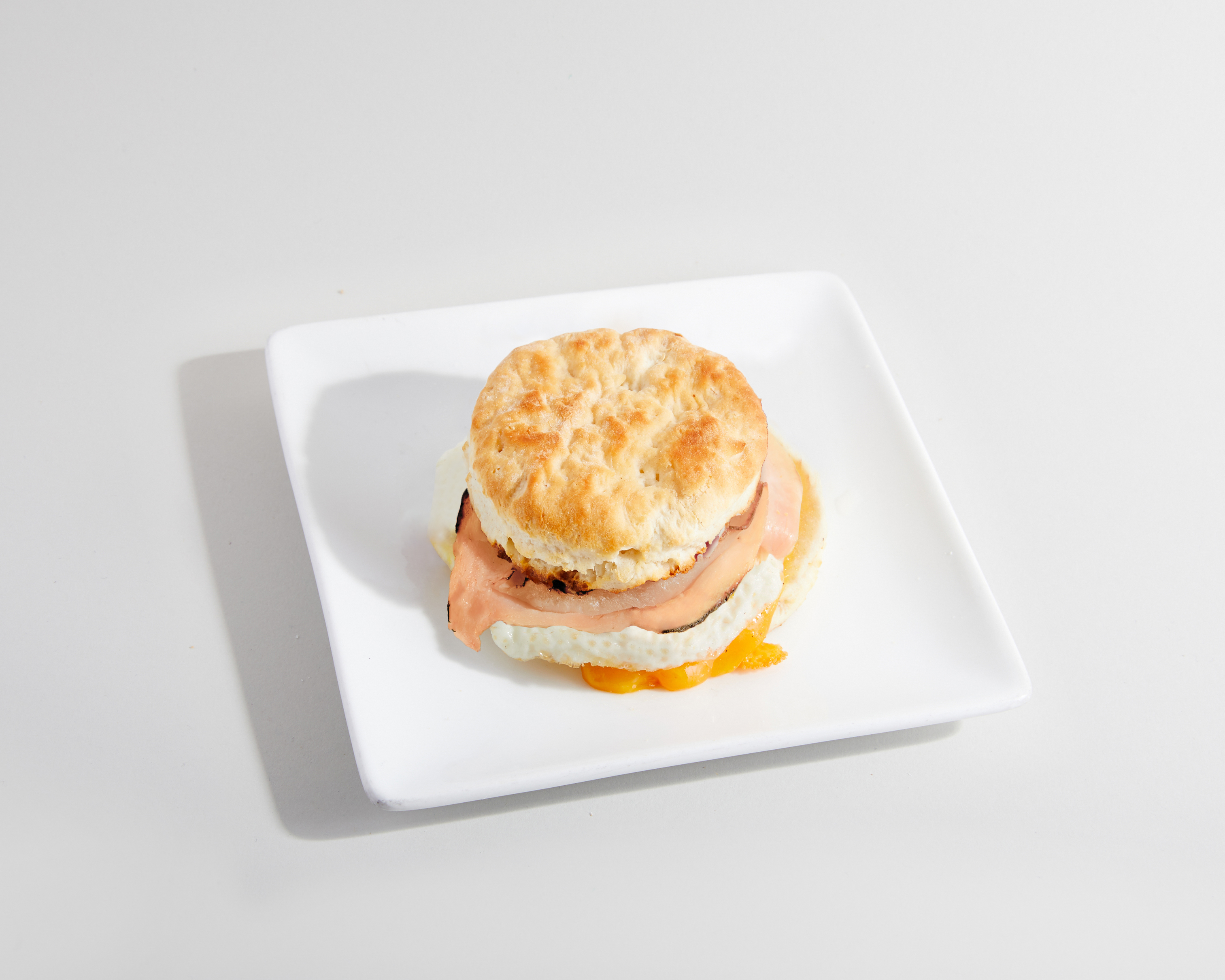 Order Biscuit Sandwich - Turkey, Egg & Cheese food online from Sweetwaters Coffee & Tea store, Naperville on bringmethat.com