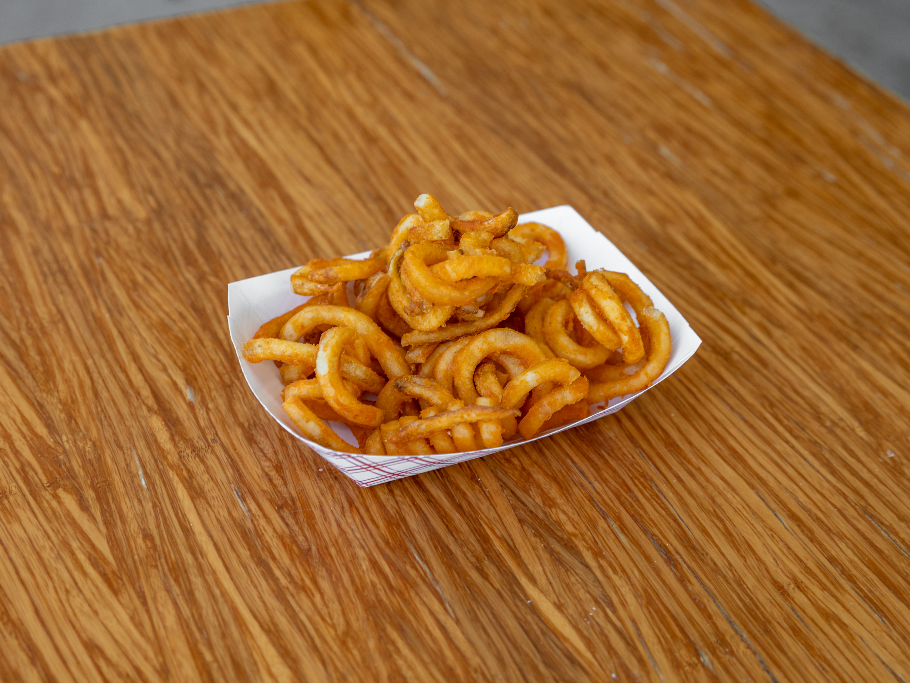 Order Curly Fries food online from Iggy Doughboys & Chowder House store, Warwick on bringmethat.com