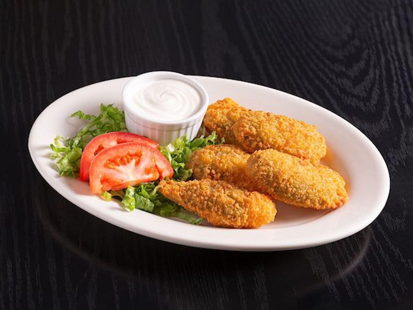 Order Jalapeno Poppers food online from El Fresco Mexican Grill store, Centreville on bringmethat.com
