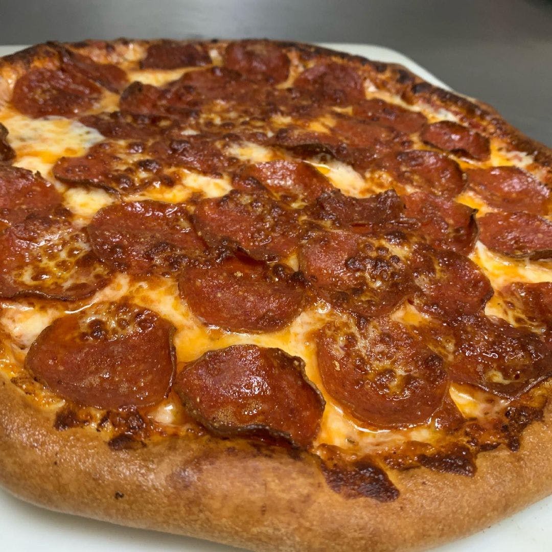 Order 1-Topping Pizza - Personal 8" (4 Slices) food online from Jax Pizza store, Moorpark on bringmethat.com