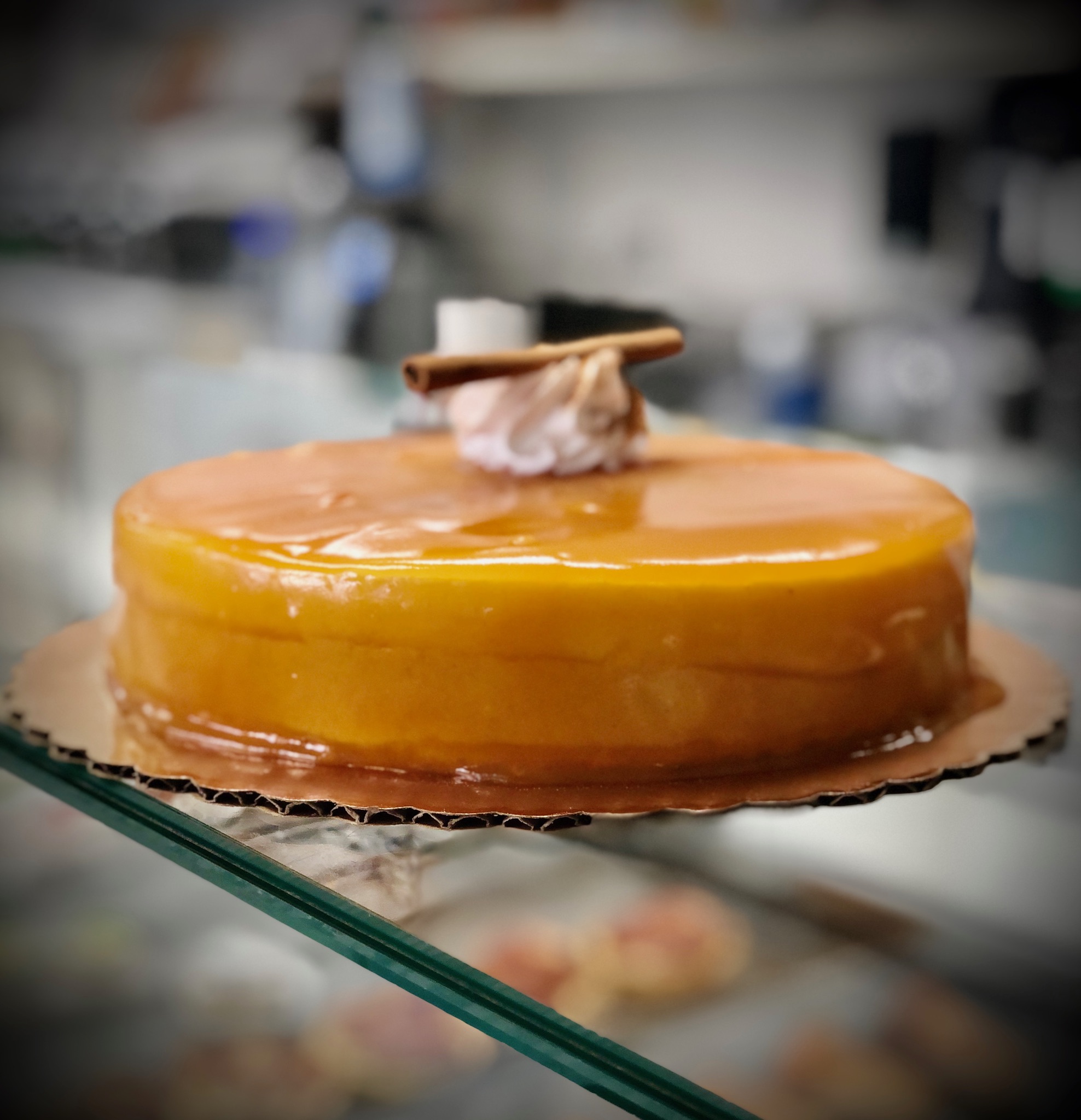 Order Orange Cinnamon Mousse Cake 8" food online from Mattarello Bakery & Cafe store, Montclair on bringmethat.com