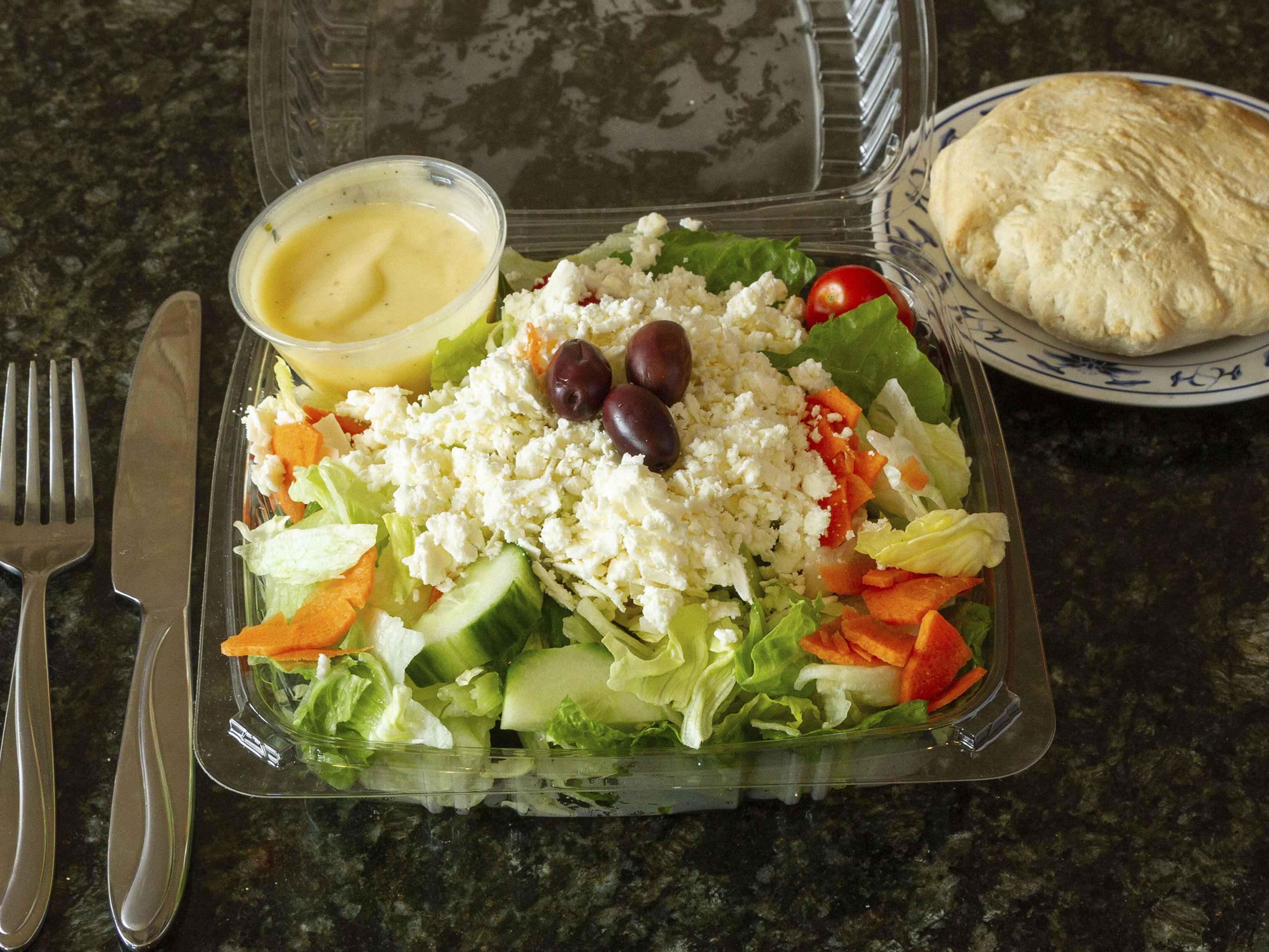 Order Greek Salad food online from Tasty Foods store, Peabody on bringmethat.com