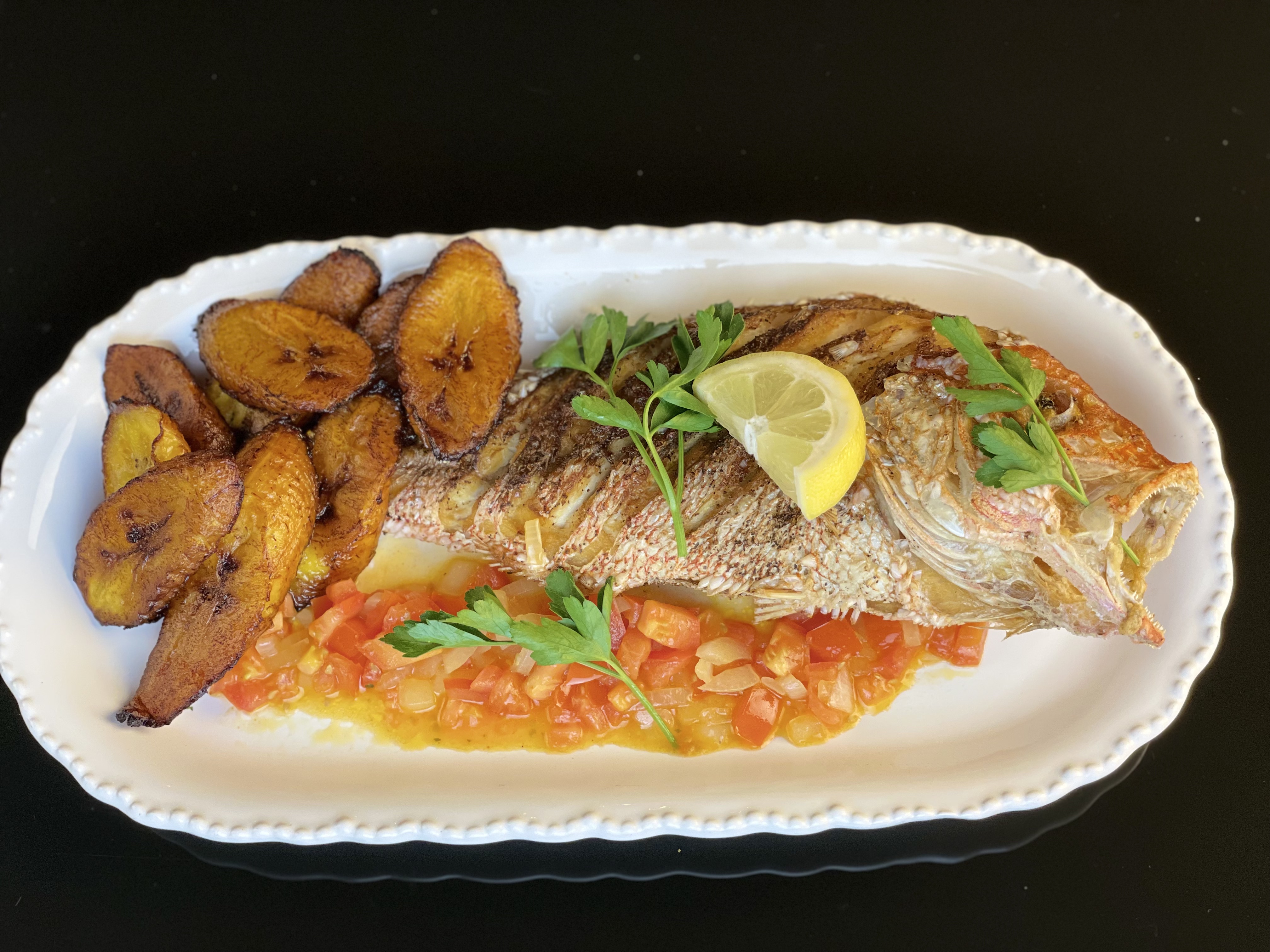 Order Red Snapper food online from Primo African Quisine store, Cleveland on bringmethat.com