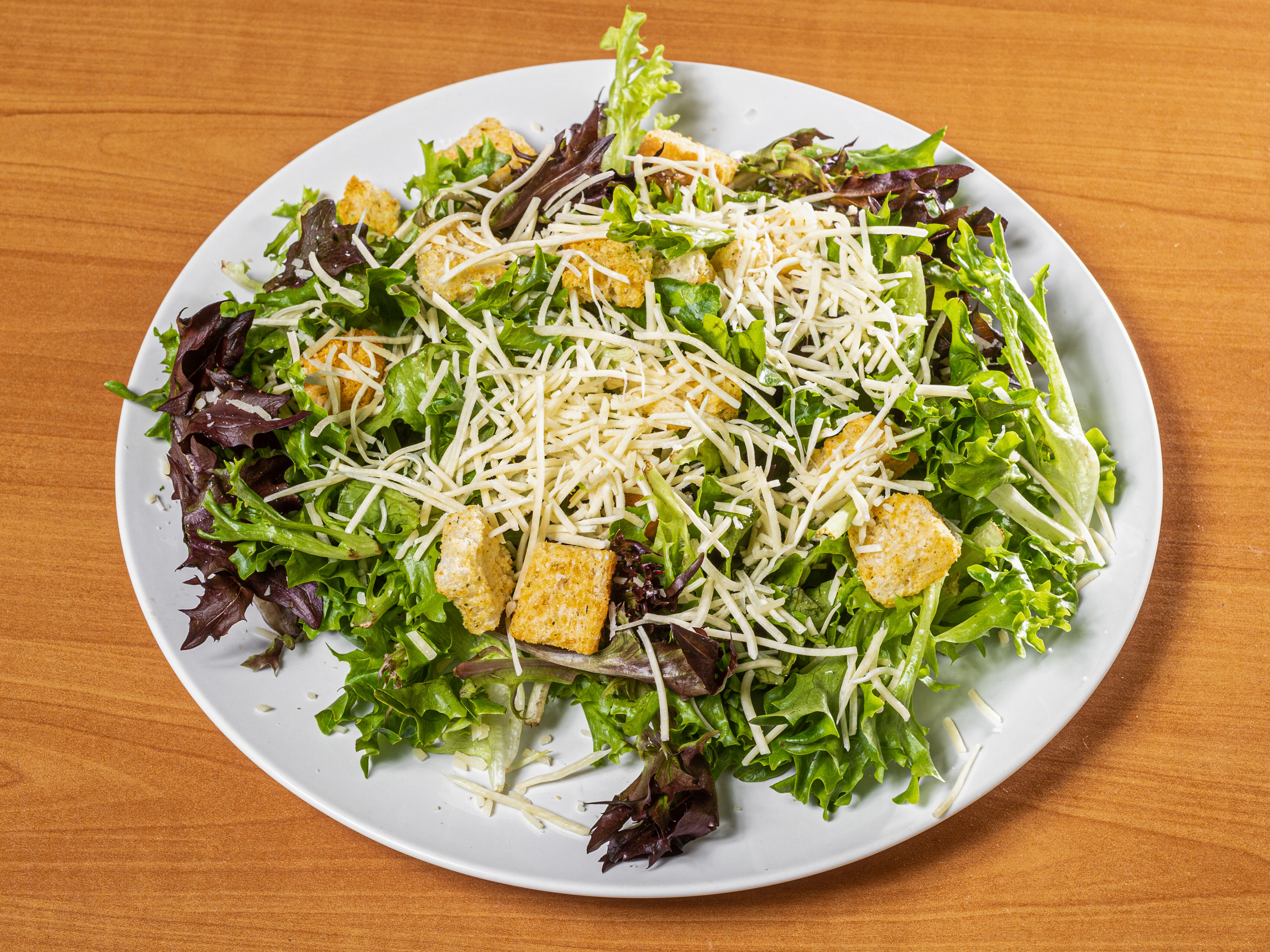 Order Caesar Salad food online from Famous Phillys Cheesesteak store, Clayton on bringmethat.com