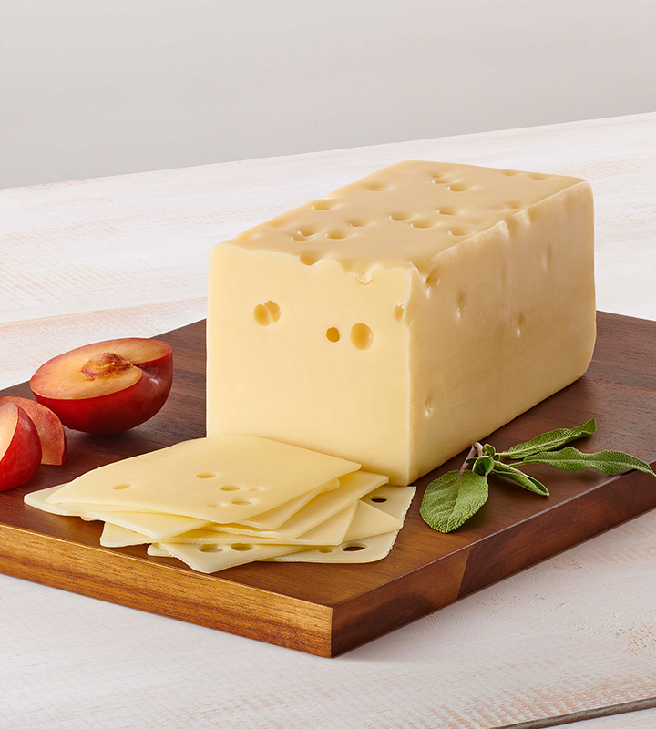 Order Swiss Cheese 1/2 lb.  food online from Trunnell Gourmet Deli On 54 store, Owensboro on bringmethat.com