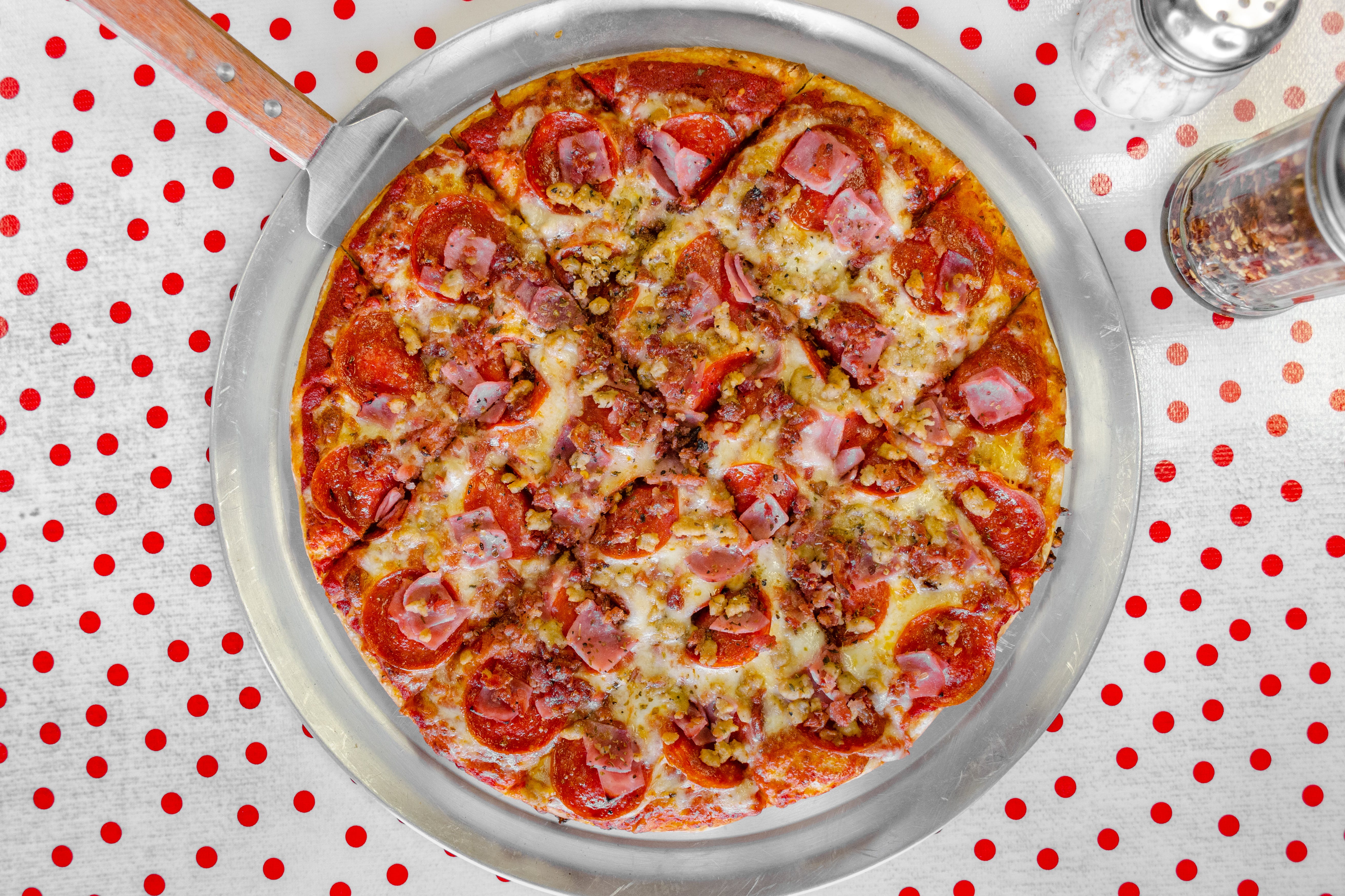 Order Meat Lover's Pizza - Small 12" food online from Saucy Sisters Pizzeria store, Leesburg on bringmethat.com