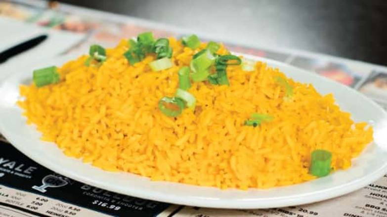 Order Yellow Rice food online from Dallas bbq store, New York on bringmethat.com