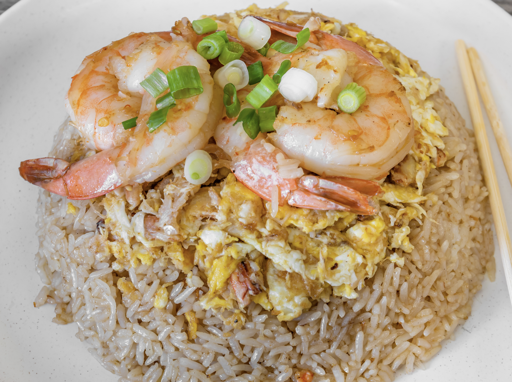 Order Crab and Shrimp fried rice  food online from Sriracha Thai Restaurant store, Carson on bringmethat.com