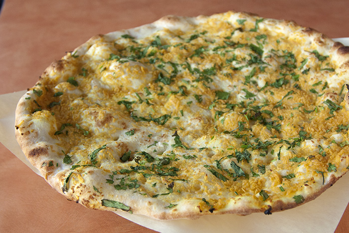 Order Garlic Naan  food online from House Of Curries - Solano Ave store, Albany on bringmethat.com