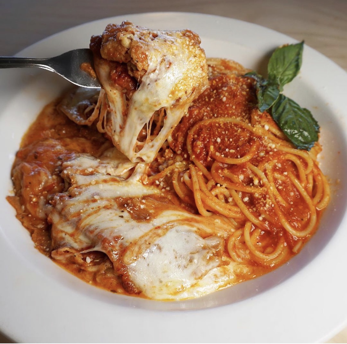 Order Chicken Parmigiana food online from Mario's Pizzeria store, Syosset on bringmethat.com
