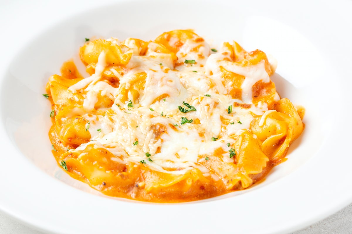 Order BAKED CHEESE TORTELLONI food online from Johnny Carino store, Fairfield on bringmethat.com