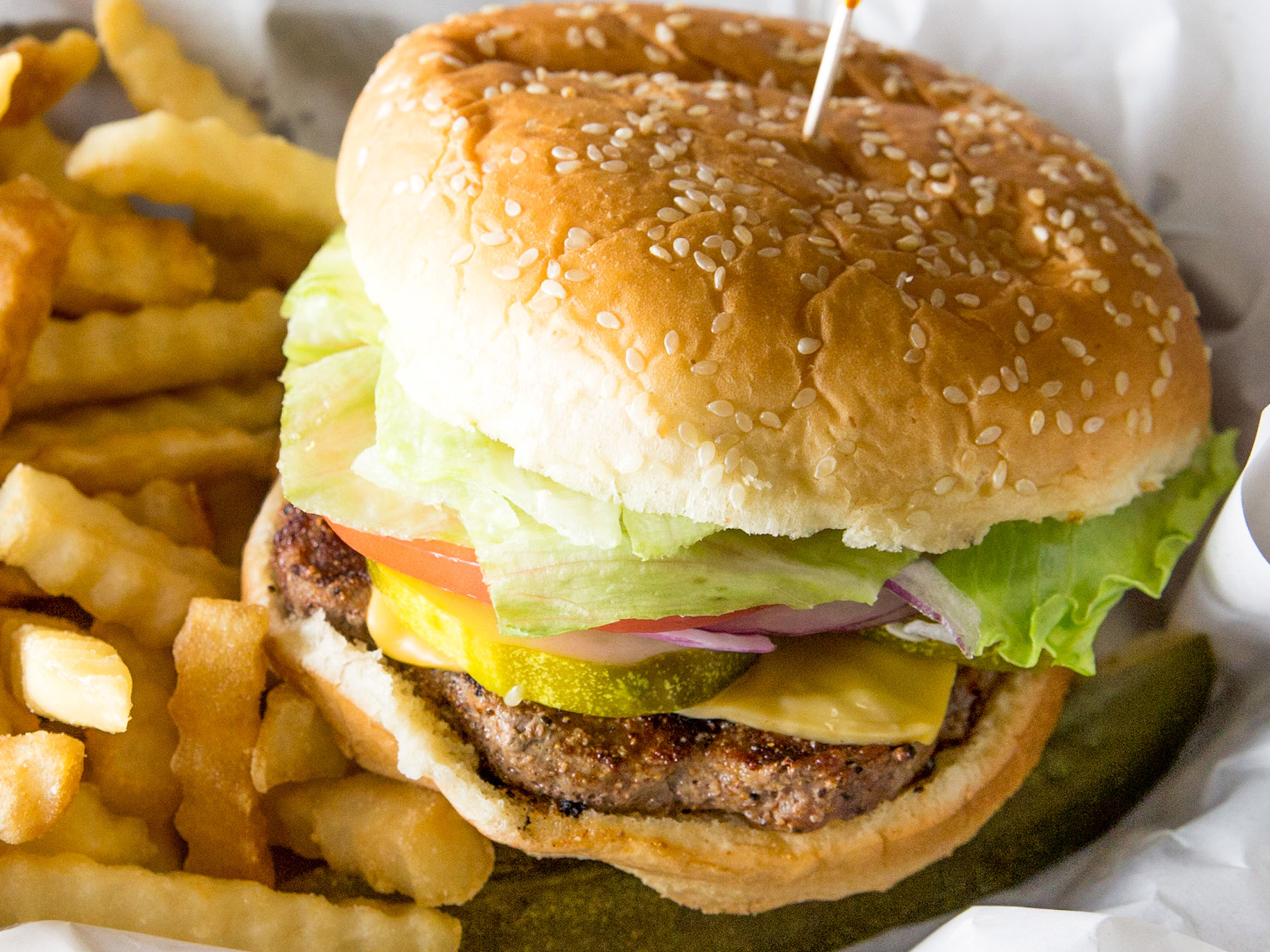 Order 1/3 lb. Hamburger with Cheese food online from Sal's Pizza Pub store, Lombard on bringmethat.com