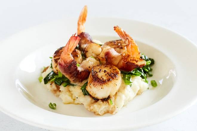 Order Seared Georges Bank Scallops & Applewood Bacon Wrapped Shrimp food online from Fish City Grill store, Houston on bringmethat.com