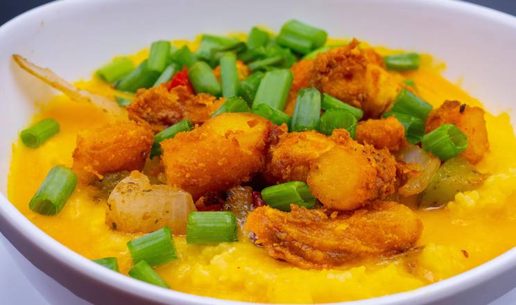 Order Cajun Cheesy Shrimp & Grits food online from Sunshine Vegan Eats store, Buffalo on bringmethat.com