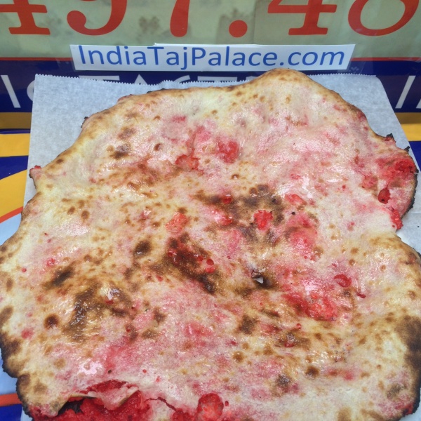 Order C1. Kashmiri Naan food online from India Taj Palace store, San Antonio on bringmethat.com