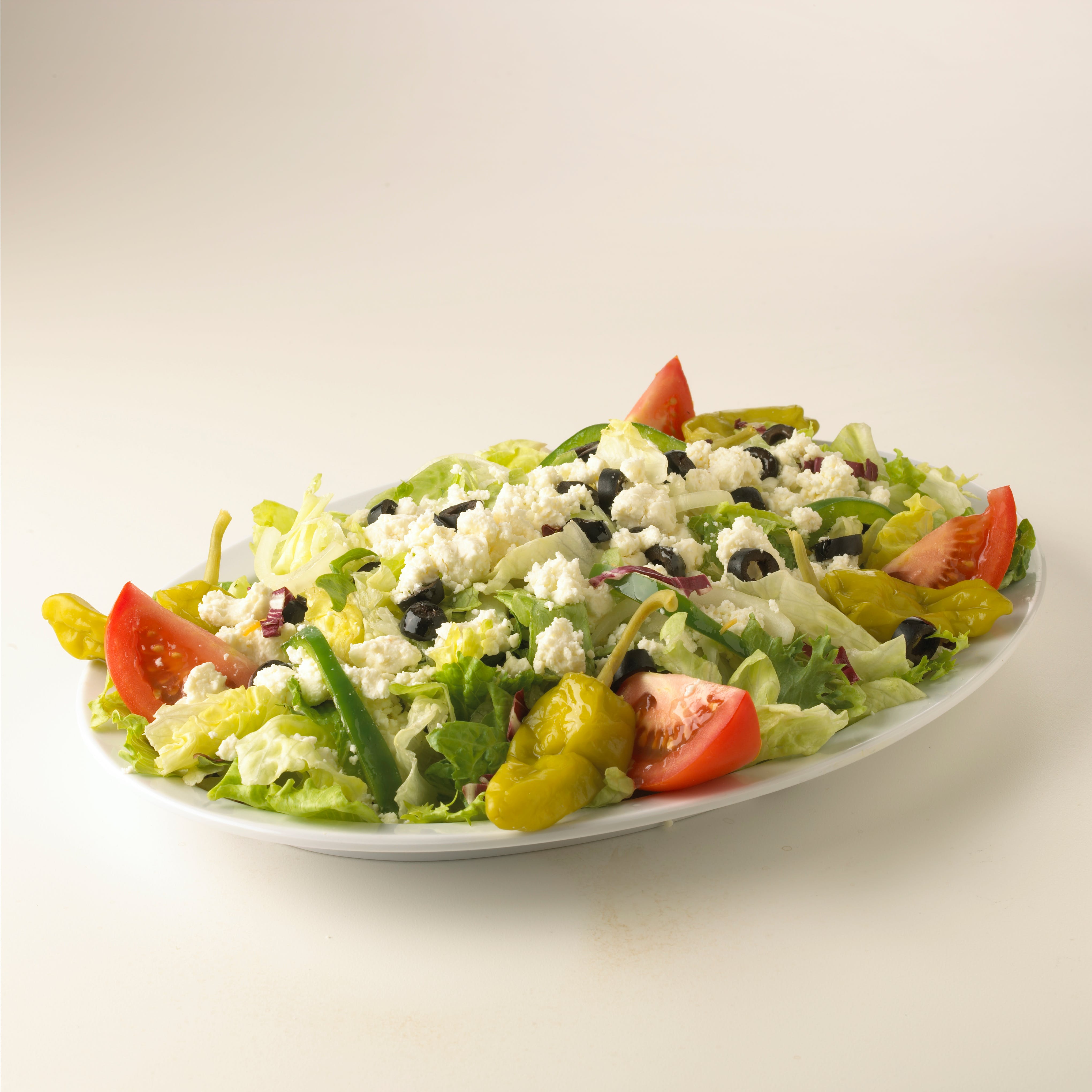 Order Greek Salad - Salad food online from Bellacino Pizza & Grinders store, South Point on bringmethat.com