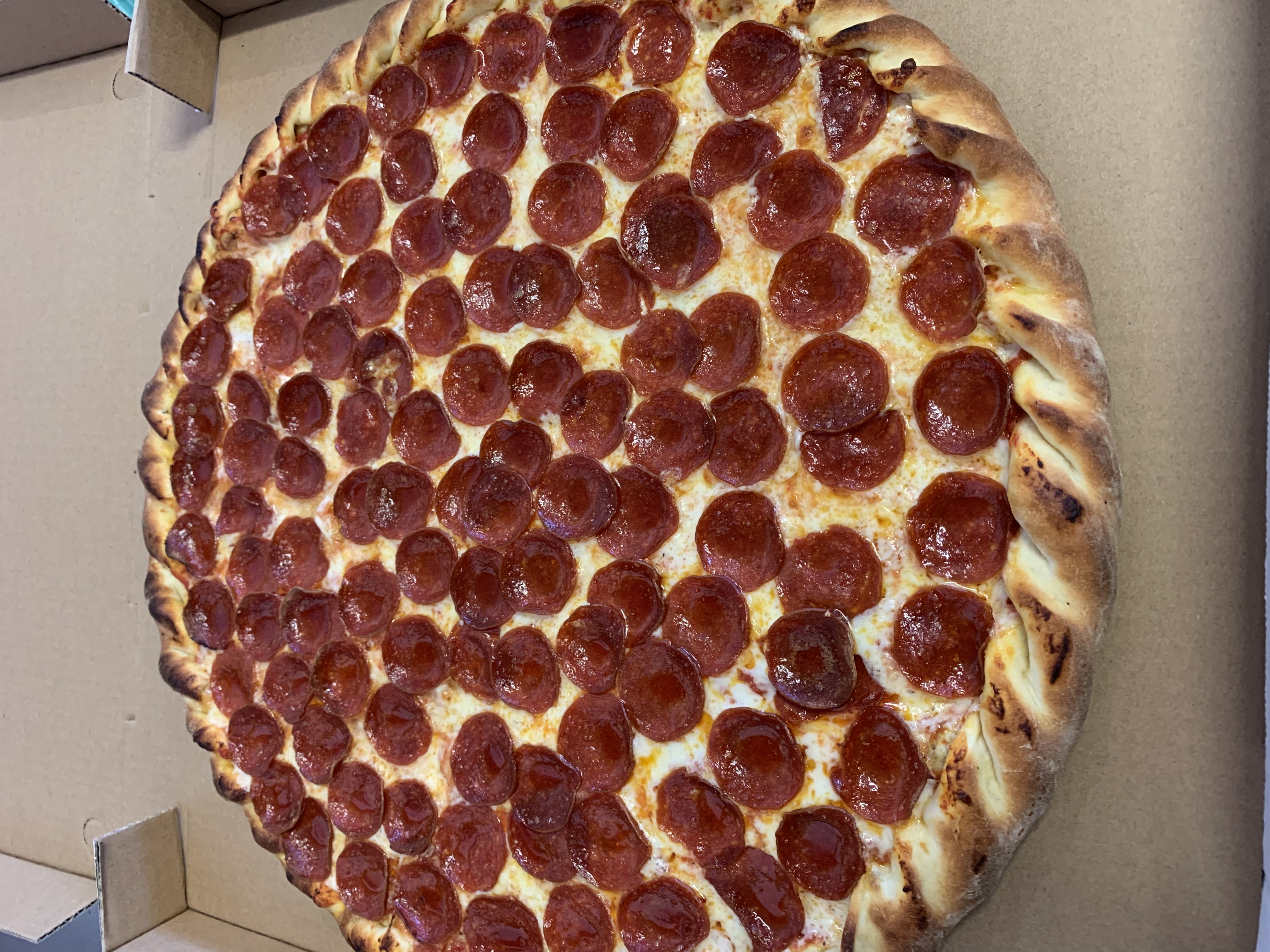 Order 1 Topping Pizza food online from Luigis Pizza store, Modesto on bringmethat.com