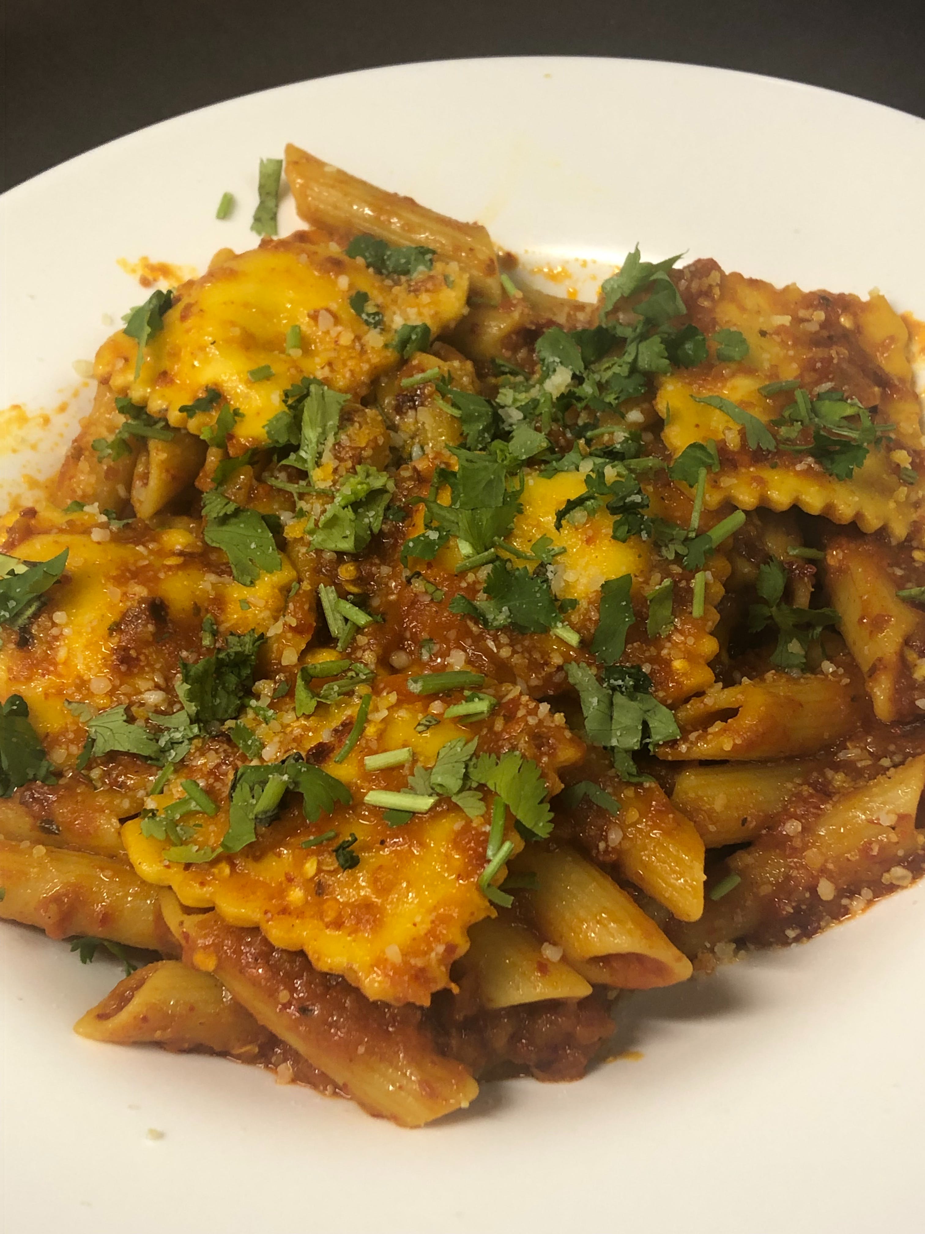 Order Spicy Ravioli Parmigiana food online from i2i Indian Italian Fusion store, Boonton on bringmethat.com