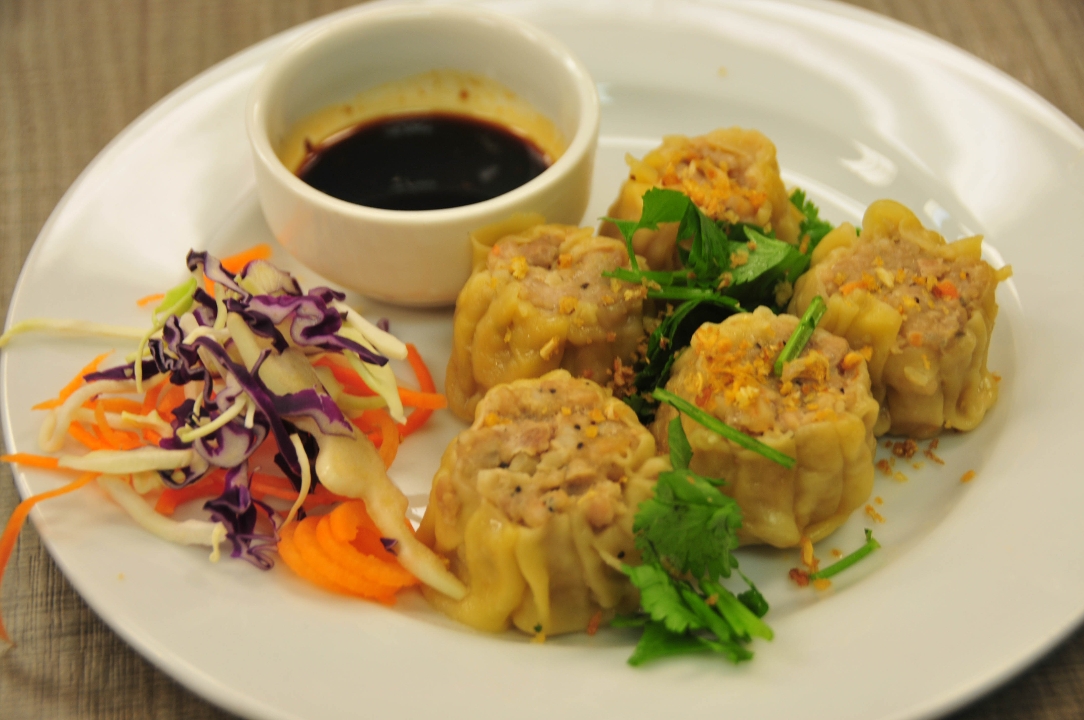 Order Dumpling food online from Saucy's Thai & Pho store, Plano on bringmethat.com