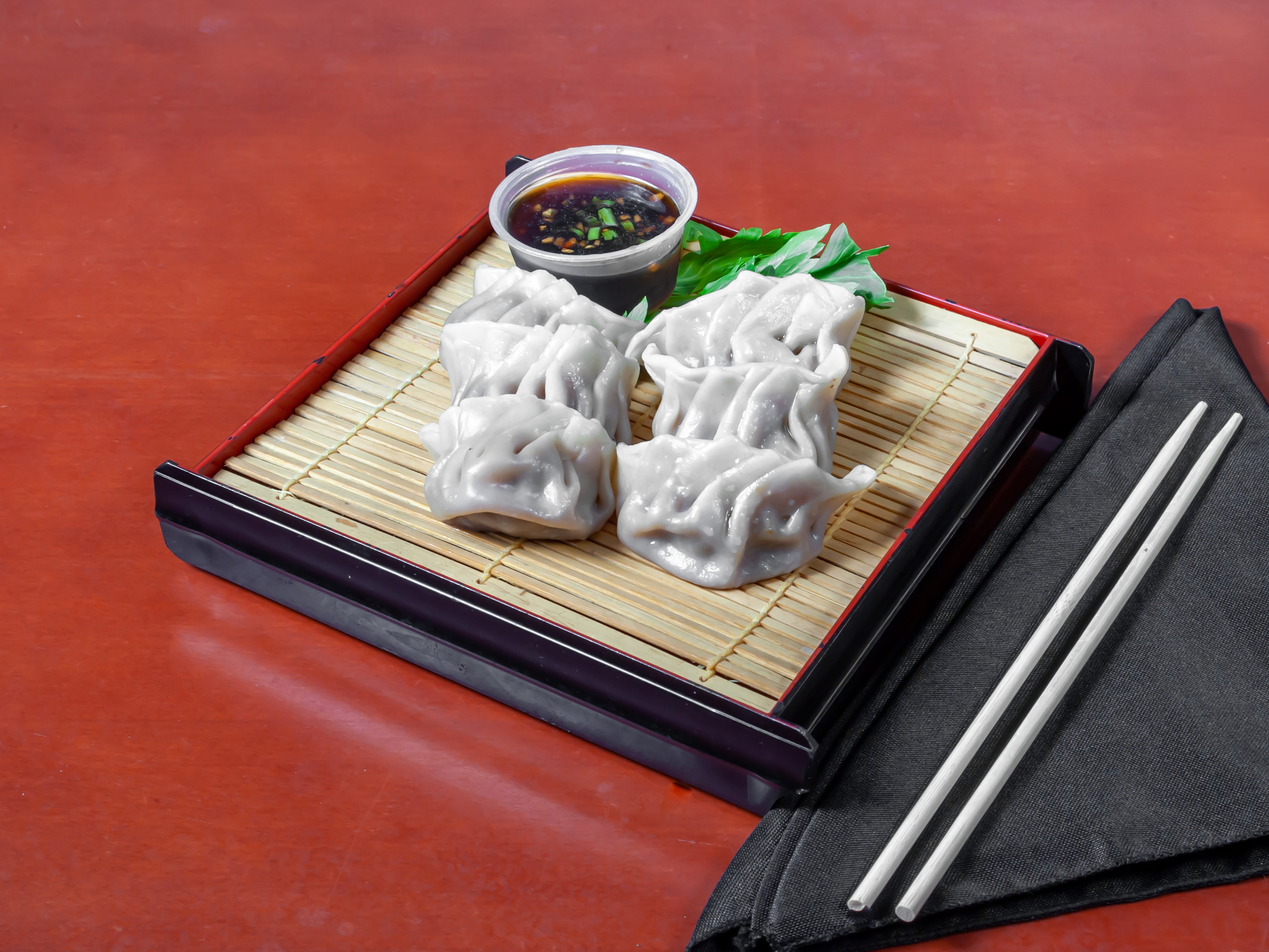 Order 8. Steamed Veggie Dumplings food online from Wang & King Asian Cafe store, Charlotte on bringmethat.com