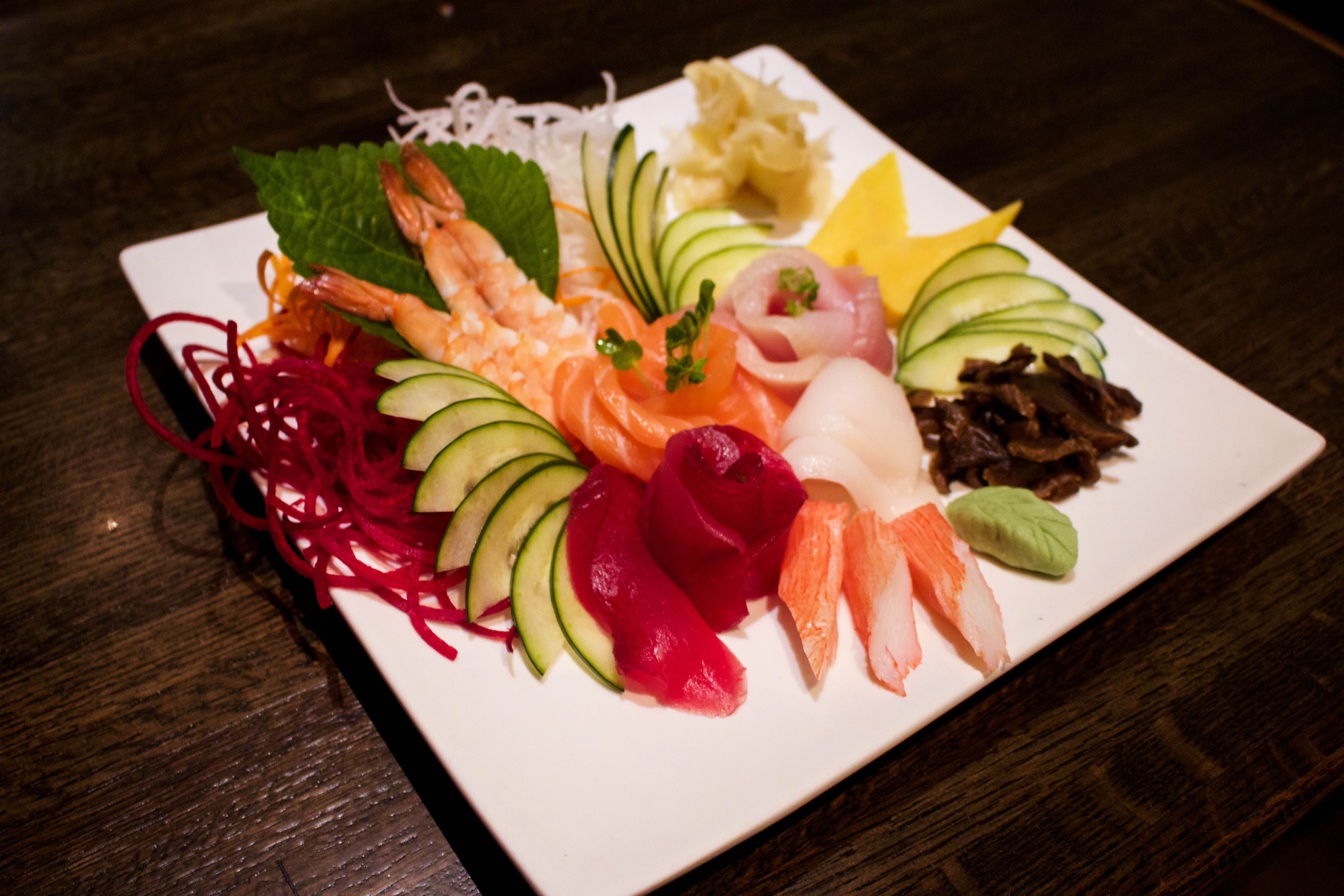 Order Assorted Sashimi food online from Zoku Sushi store, Chicago on bringmethat.com