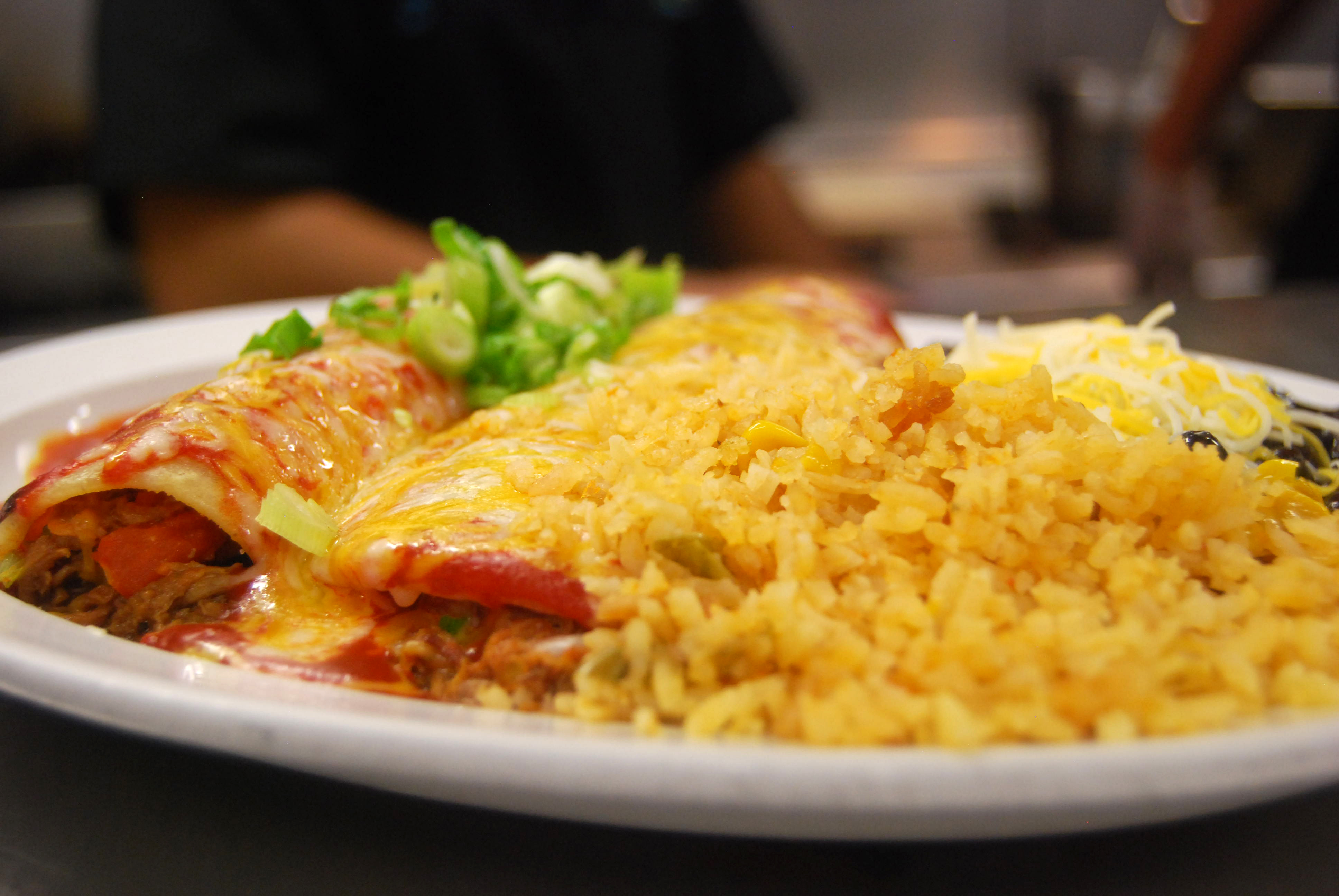 Order Beef Enchilada Plate food online from Coyote Grill store, Laguna Beach on bringmethat.com