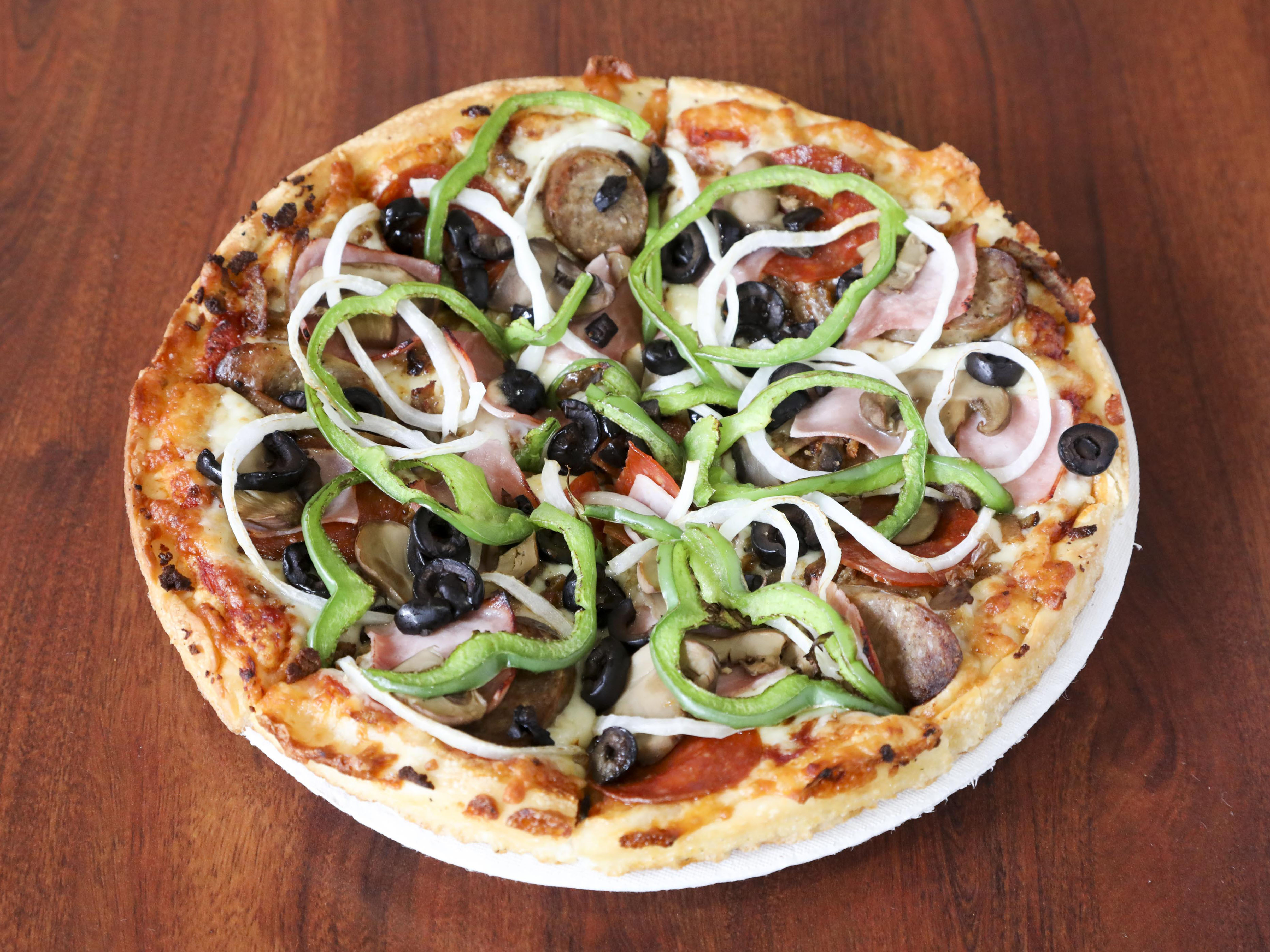 Order Special Pizza food online from Singas Famous Pizza store, Glen Oaks on bringmethat.com