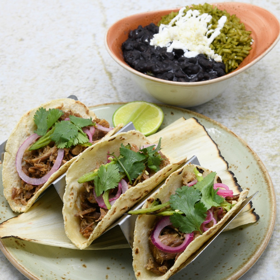 Order Carnitas food online from Dos Caminos store, New York on bringmethat.com