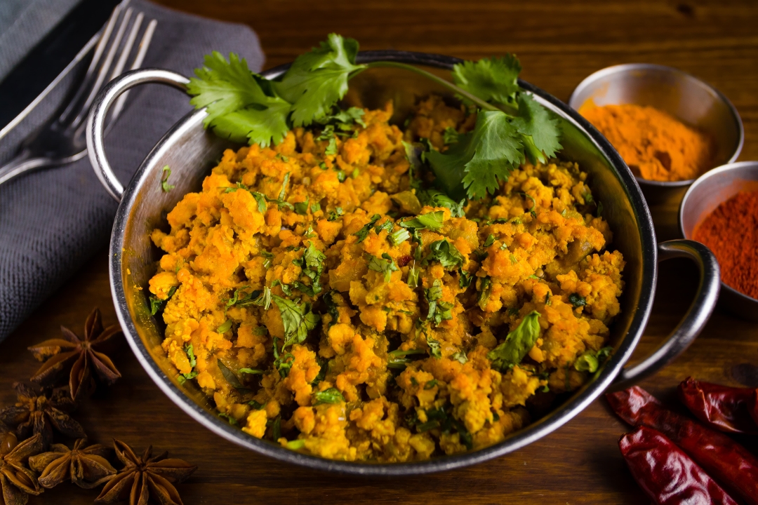 Order Murgh Bharta food online from Dhaba indian cuisine store, New York on bringmethat.com