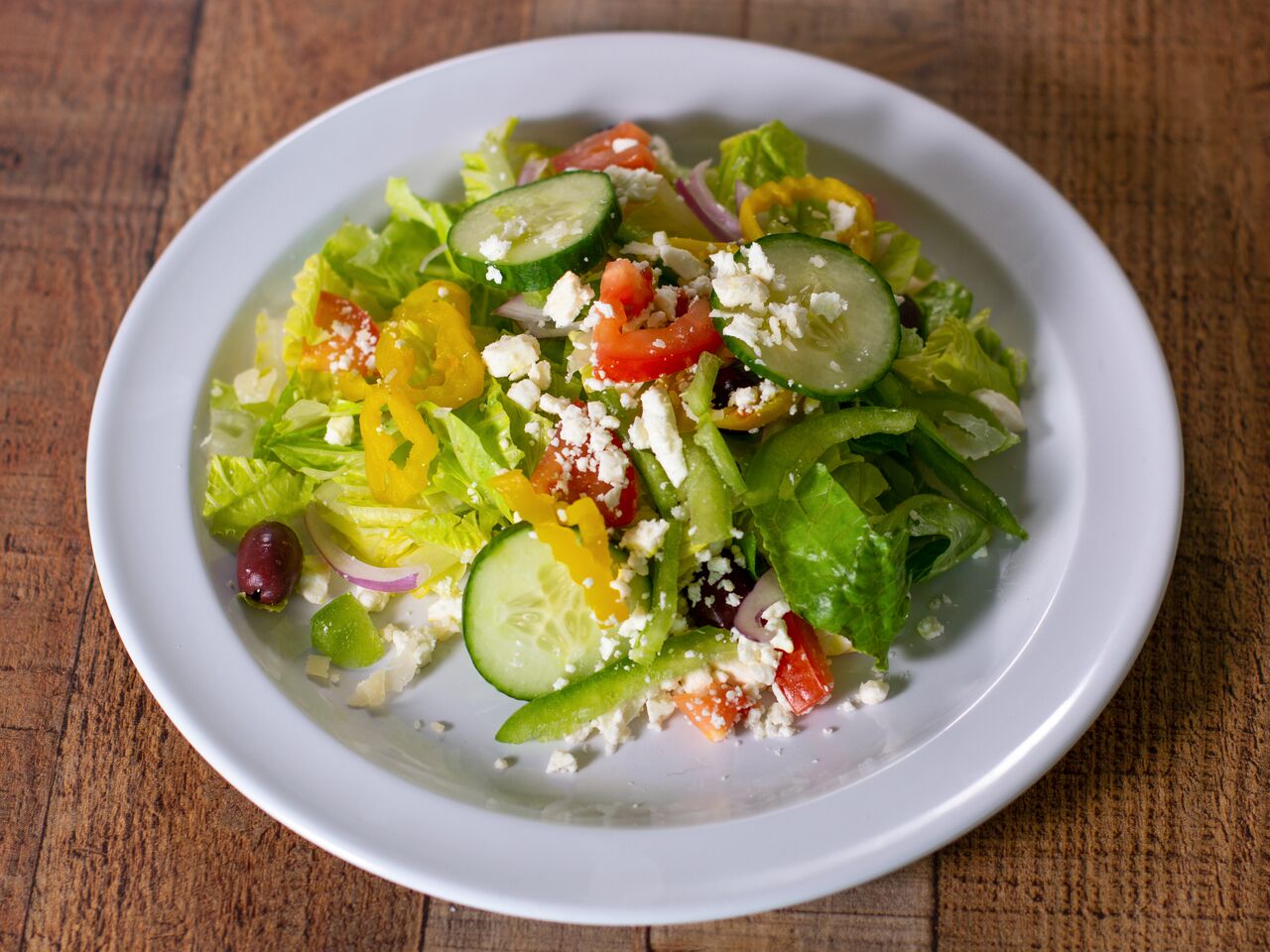 Order Greek Salad food online from Brooklyn Pie Company store, Austin on bringmethat.com