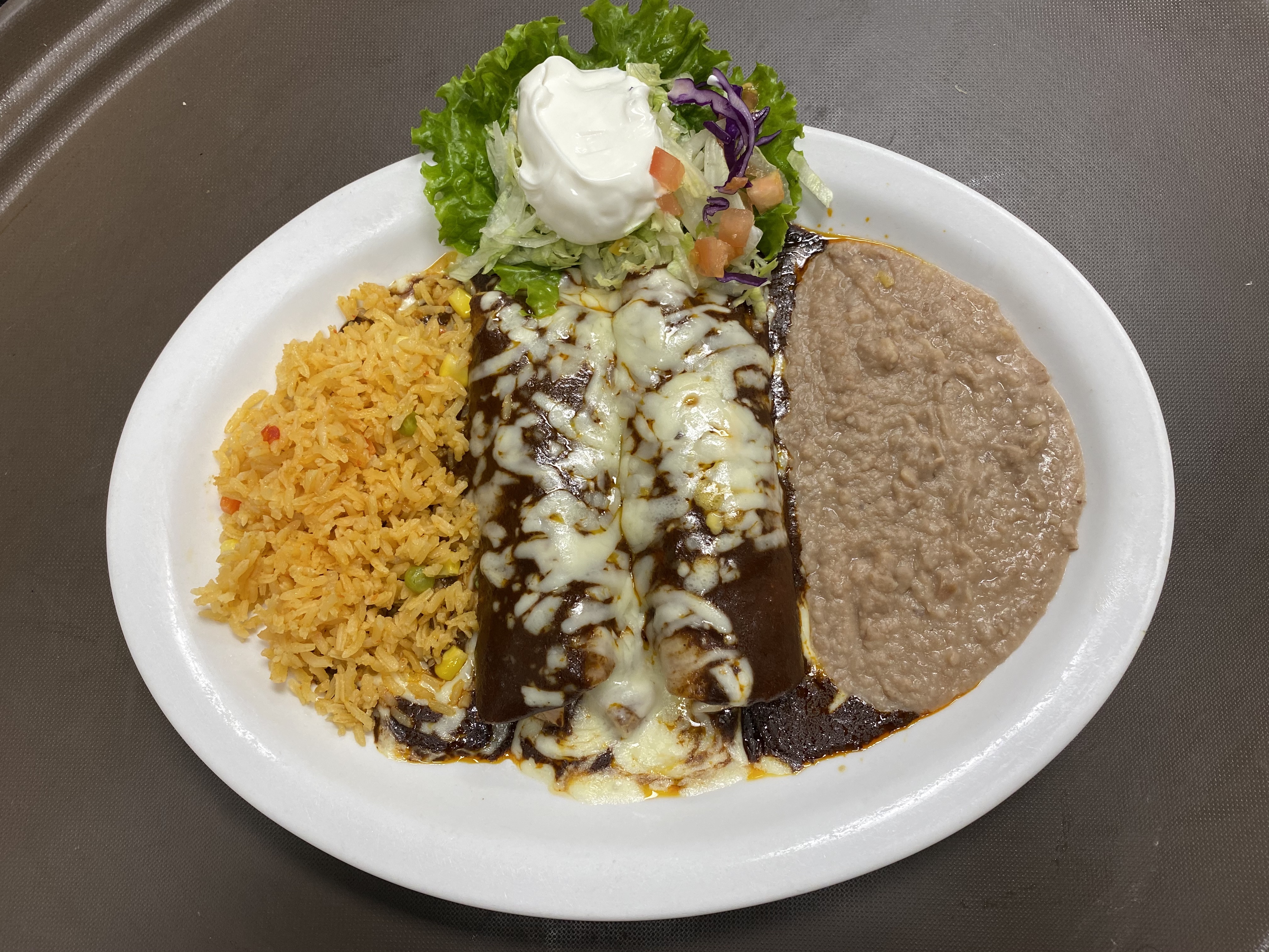 Order Mole Enchilada food online from Moreno Mexican Restaurant store, Pearland on bringmethat.com