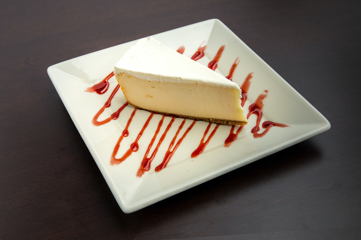 Order New York Cheesecake food online from The Old Spaghetti Factory store, Fresno on bringmethat.com
