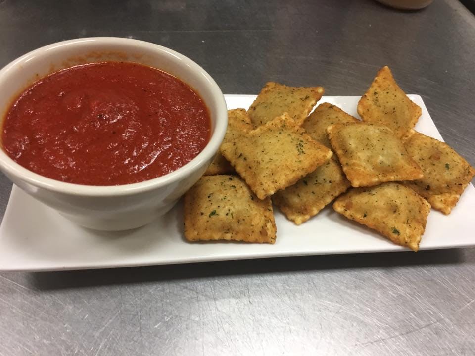 Order Toasted Meat Ravioli - Appetizer food online from Pino's on Main Pizza store, Rockford on bringmethat.com