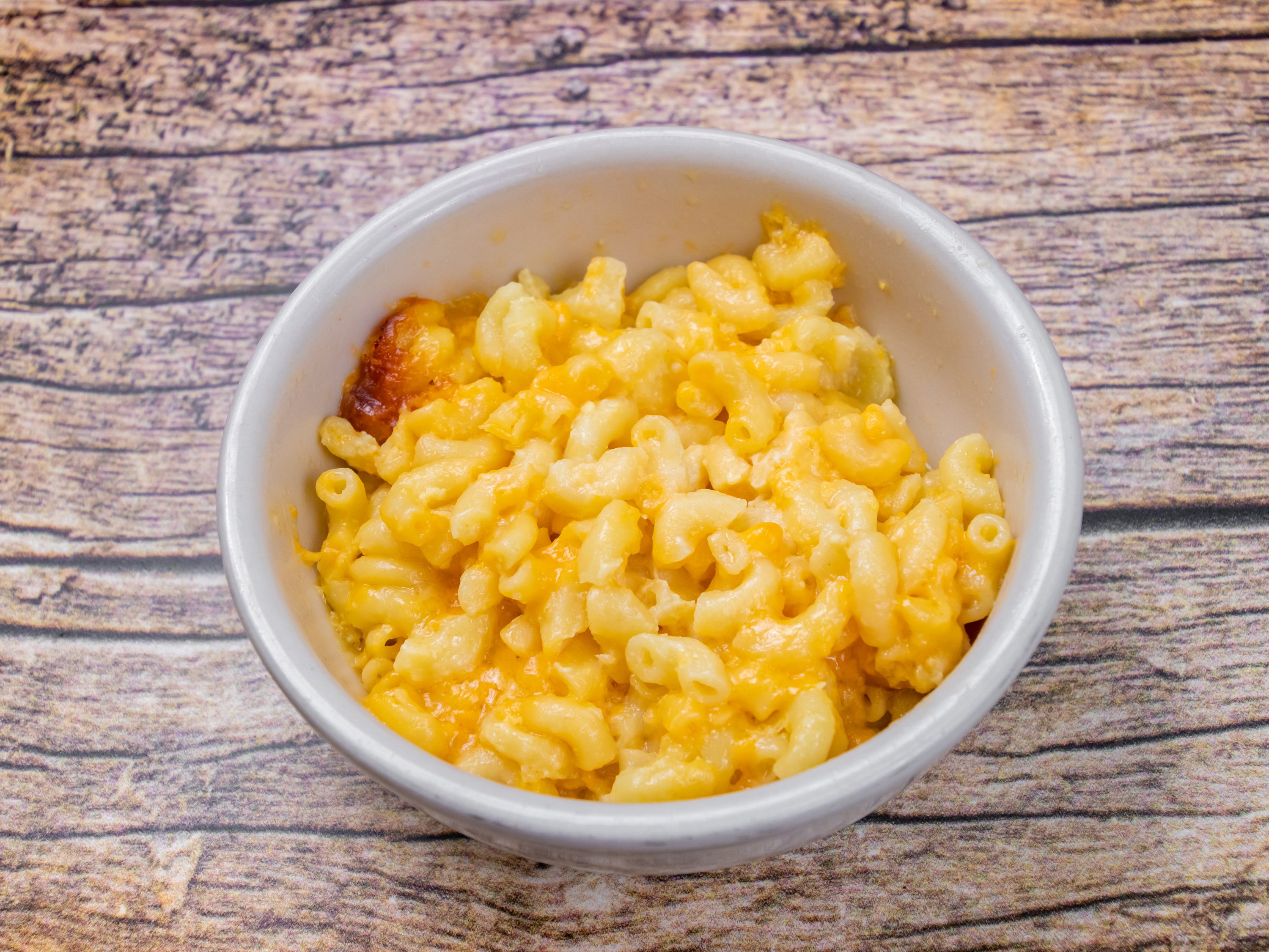 Order Mac and Cheese food online from Lyons Jamaican Cuisine Llc store, Norcross on bringmethat.com