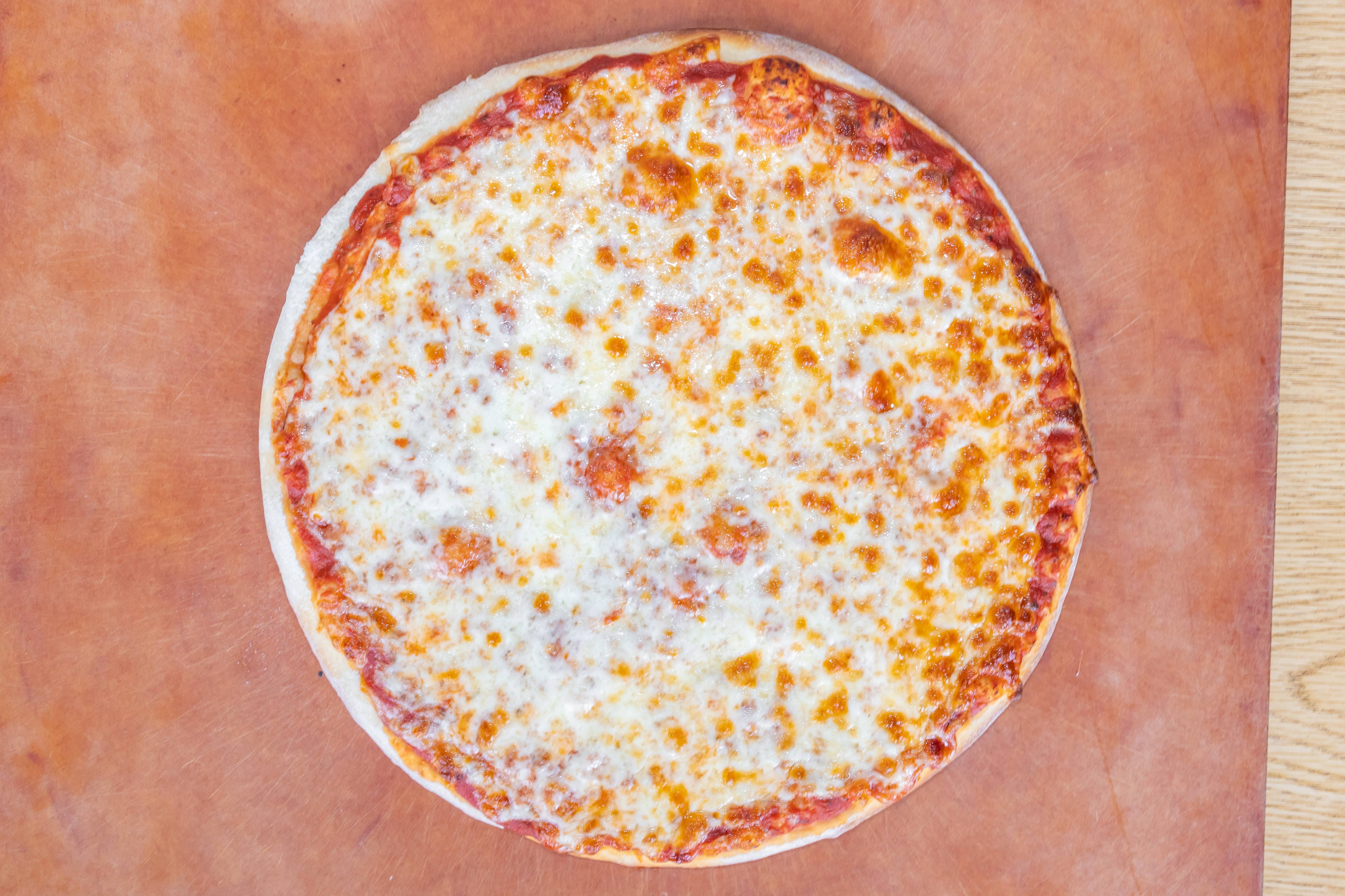 Order Cheese Pizza - Medium 12'' food online from Emilio's Pizza store, Burbank on bringmethat.com