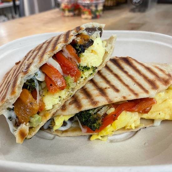 Order Roasted Veggie Breakfast Panini food online from Evexia Cafe.Bakery.Market store, Aurora on bringmethat.com
