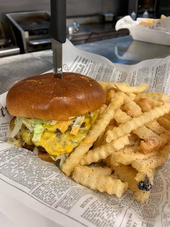 Order Chasers Burger - 1/2 lb. food online from Chasers Sports Bar & Grill store, Niles on bringmethat.com